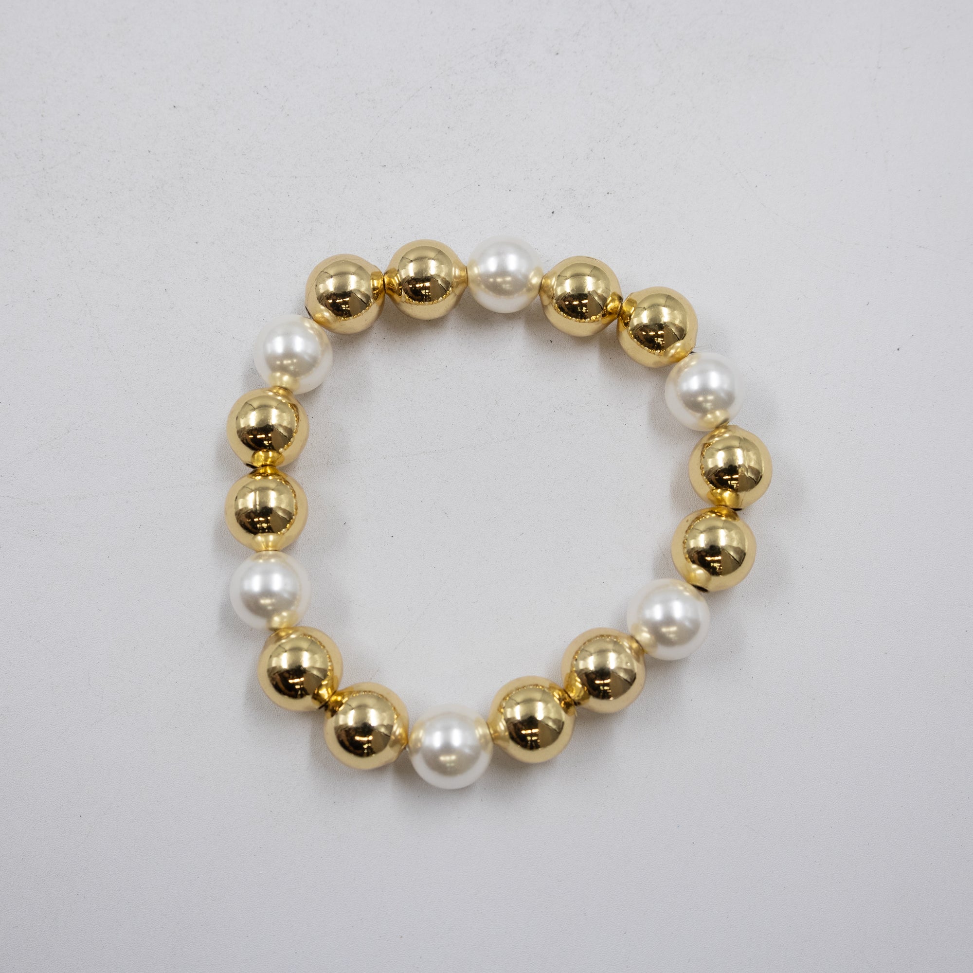Pulseras Doradas y Plateadas con dije M1 Oro Laminado