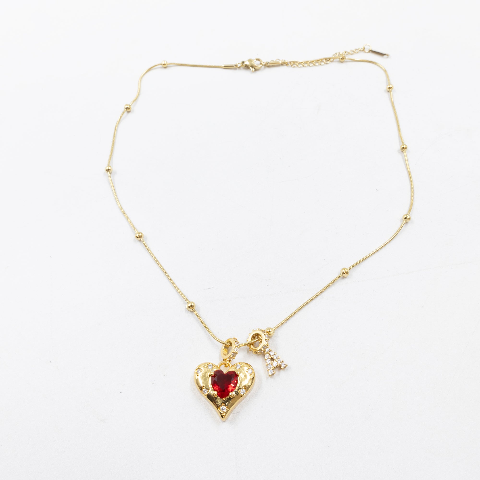 Collares Dorados con dije de Letra y corazon M1 Oro Laminado