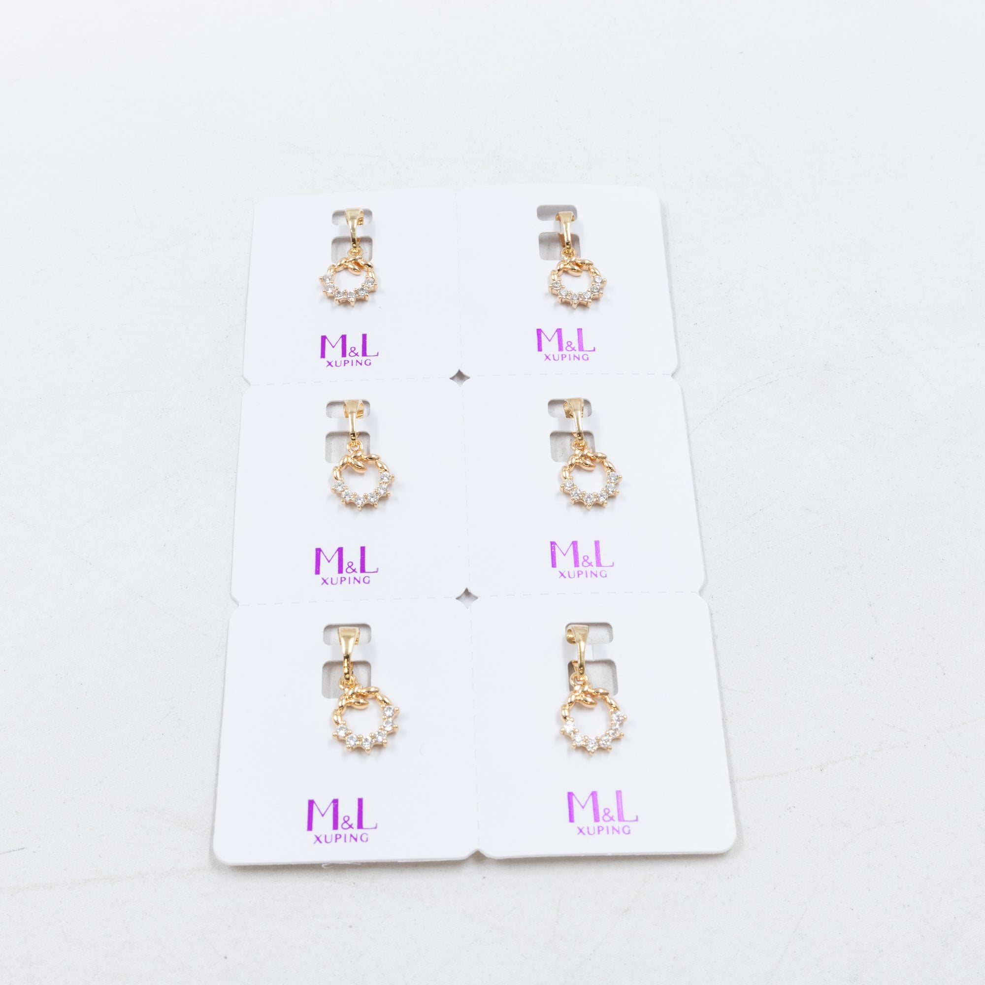 Paquete de 6 dijes con Piedras Oro Rosado  M6 Oro Laminado