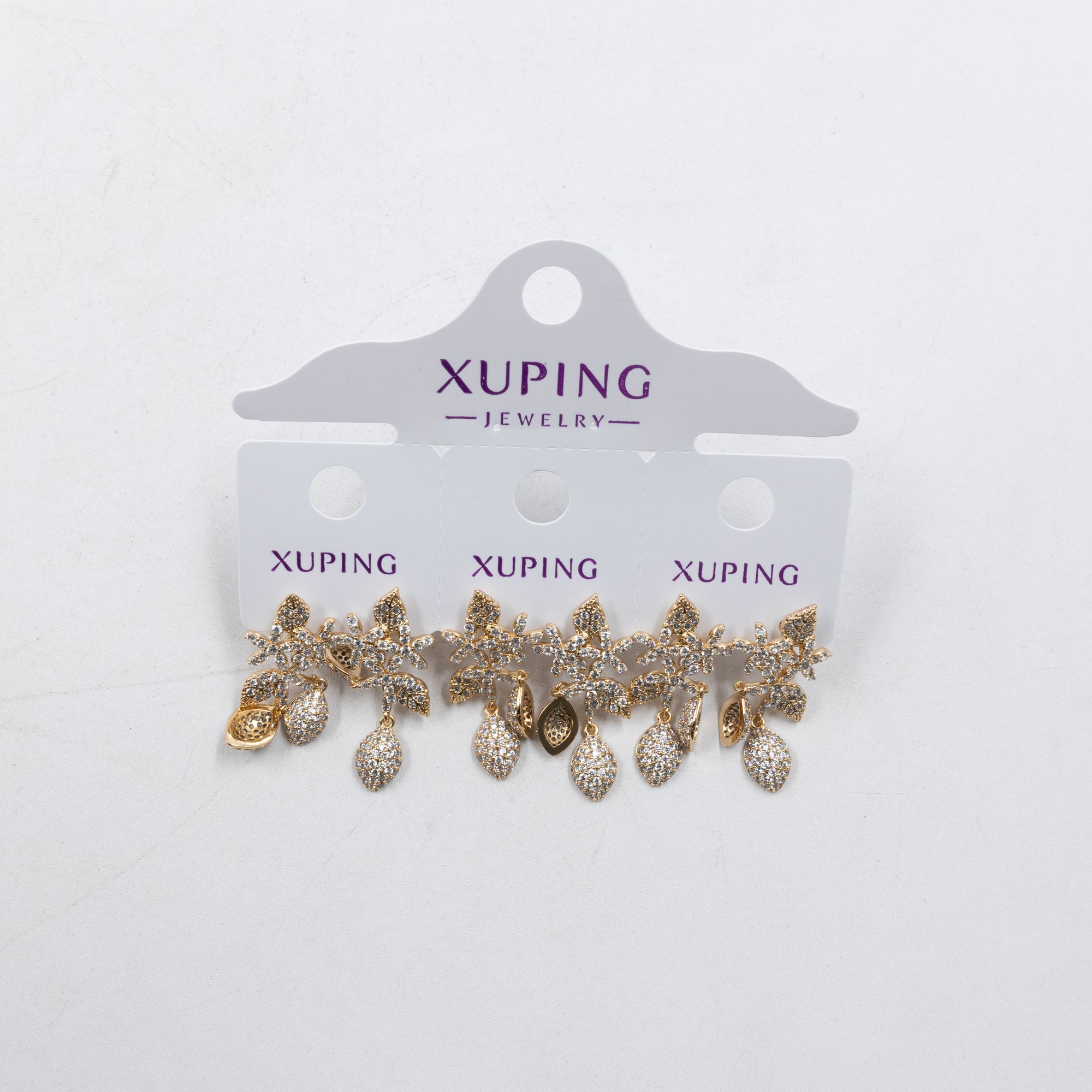 Paquete de tres pares de Aretes Dorados Xuping con piedras M6 Oro Laminado