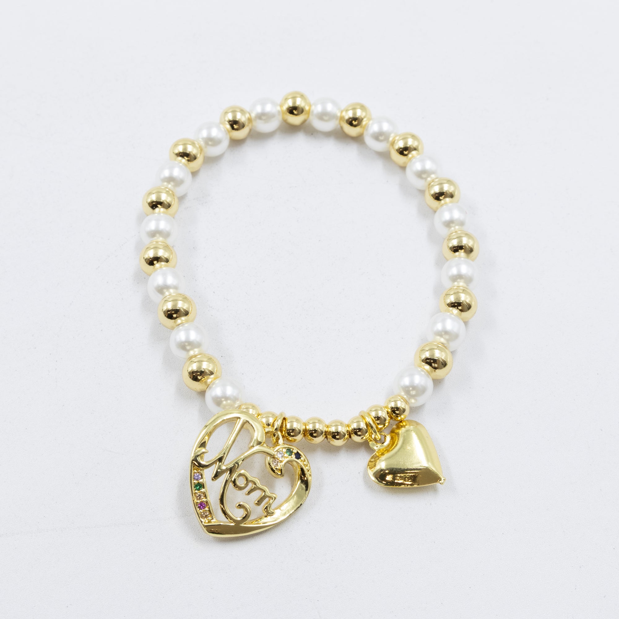 Pulsera con dije de Mamá M2 Oro Laminado 05/03/26