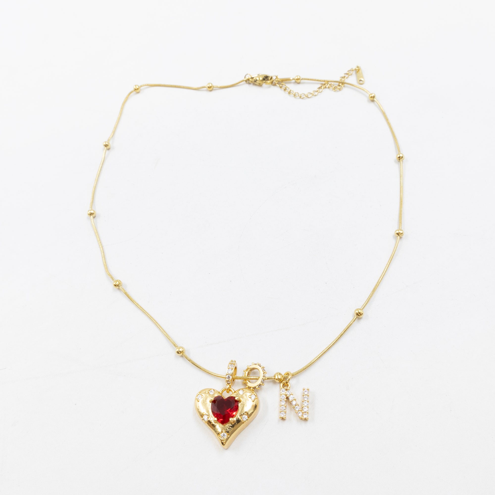 Collares Dorados con dije de Letra y corazón M3 Oro Laminado