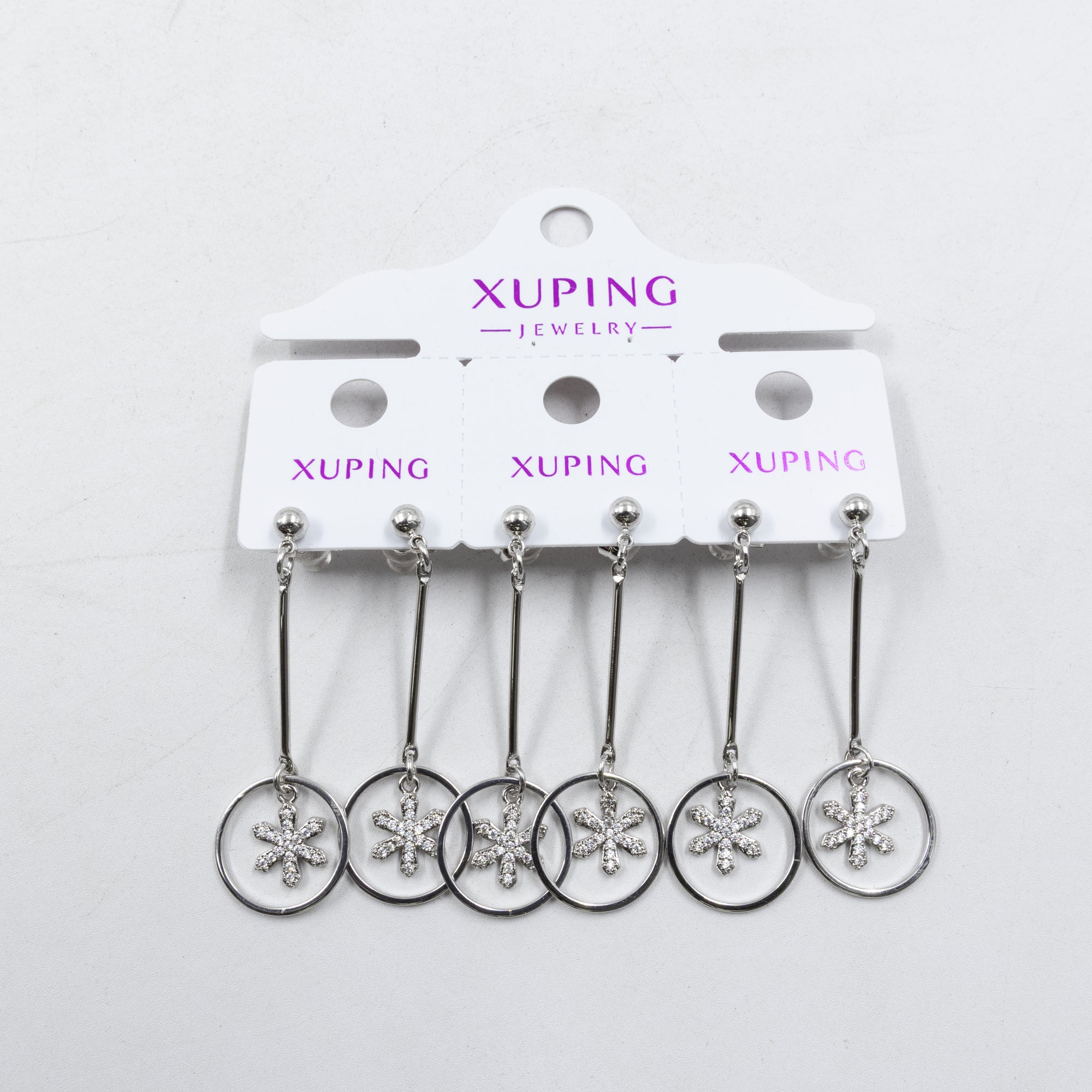 Paquete de tres pares de Aretes Plateados Xuping con piedras M4 Oro Laminado