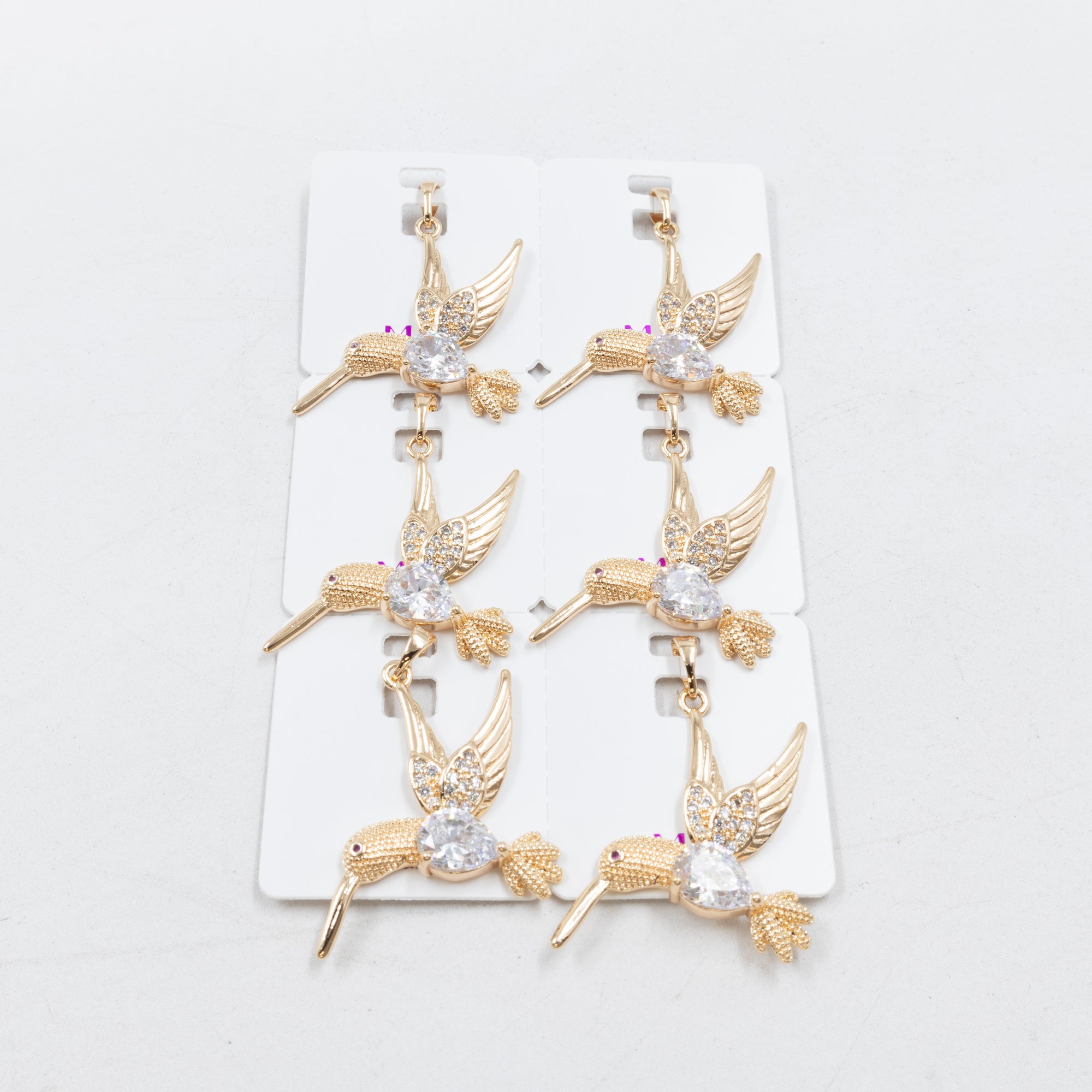 Paquete de 6 dijes con Piedras Oro Rosado  M8 Oro Laminado
