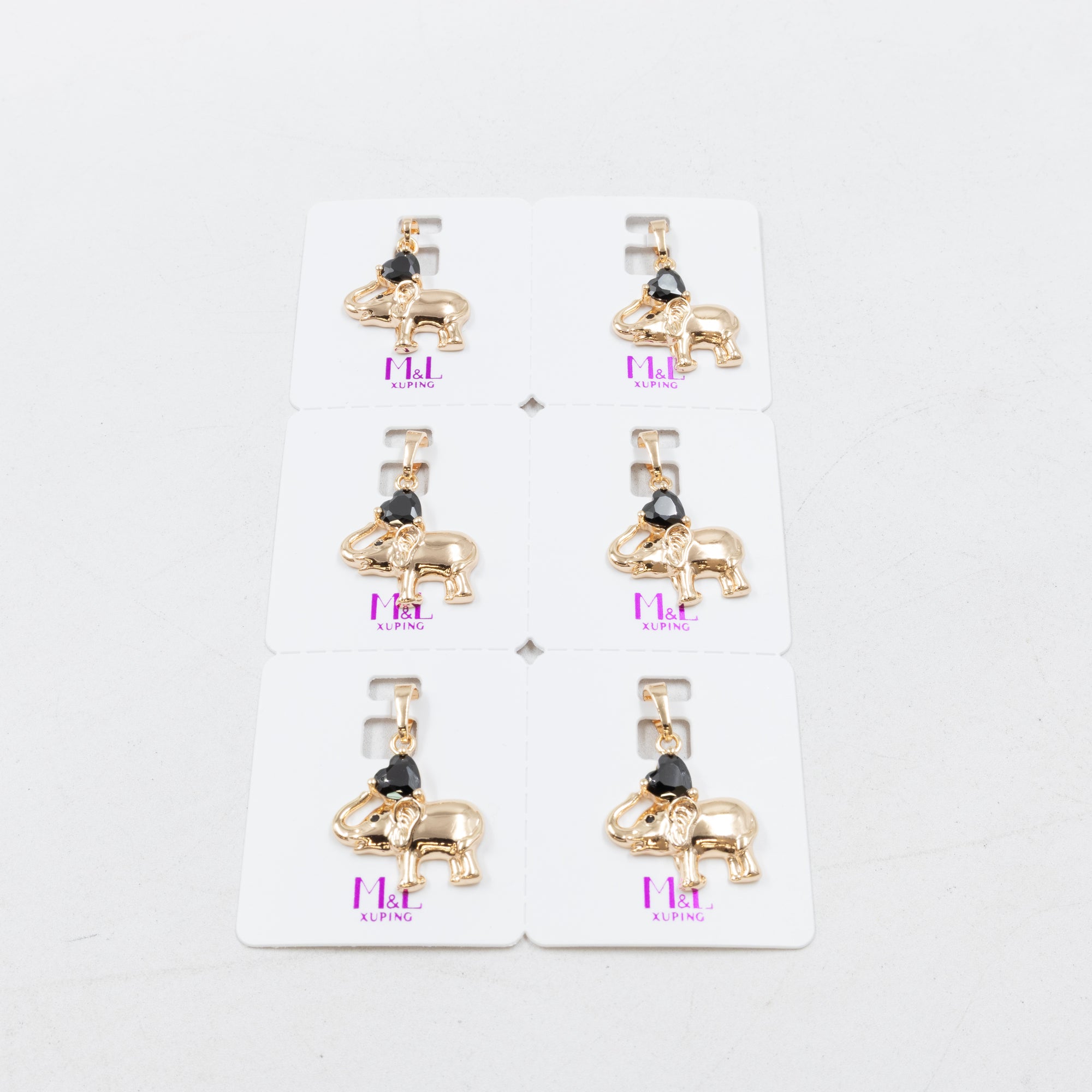 Paquete de 6 dijes con Piedras Oro Rosado  M5 Oro Laminado