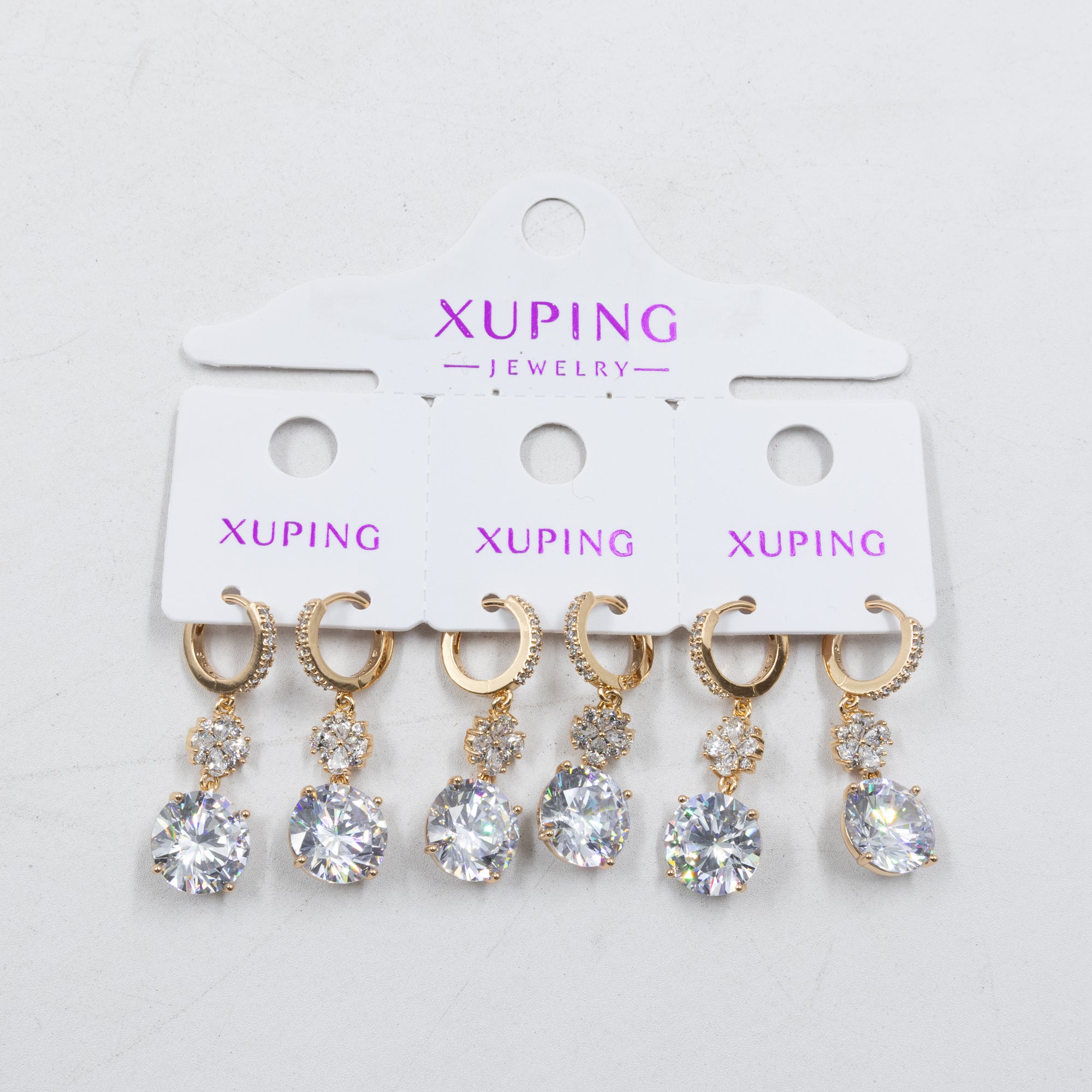 Paquete de tres pares de Aretes Dorados Xuping con piedras M5 Oro Laminado