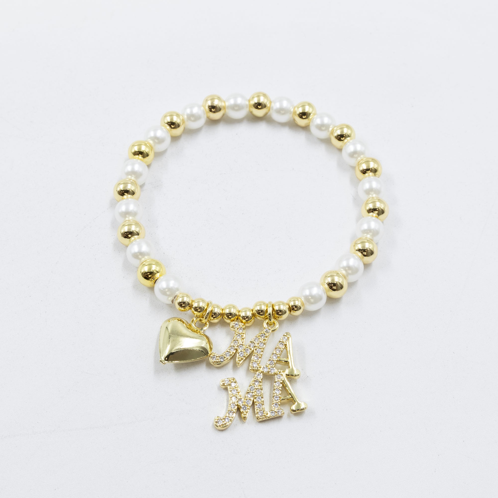 Pulsera con dije de Mamá M3 Oro Laminado 05/03/26