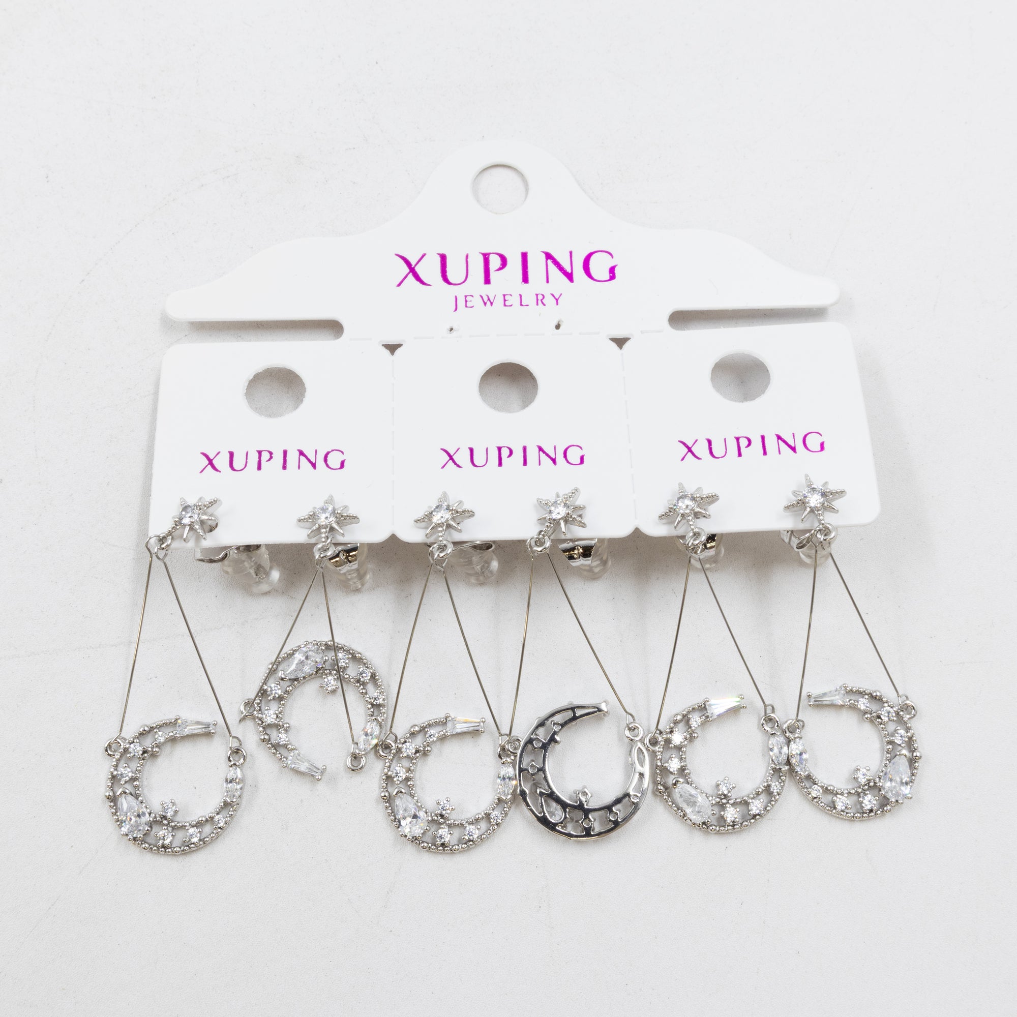 Paquete de tres pares de Aretes Plateados Xuping con piedras M3 Oro Laminado