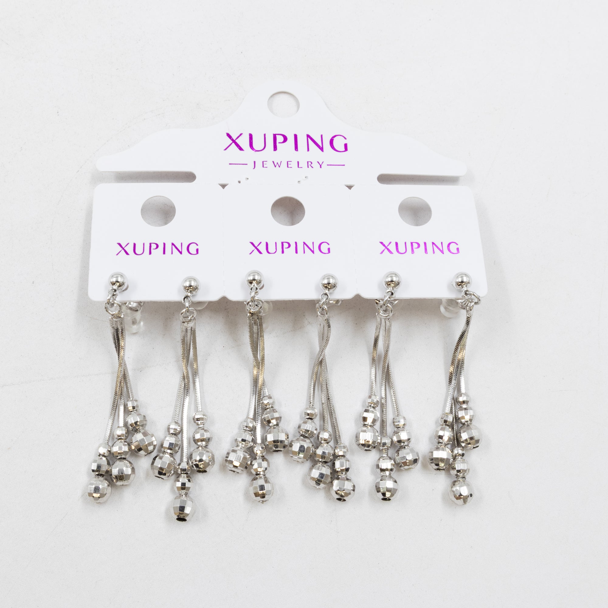 Paquete de tres pares de Aretes Plateados Xuping con piedras M2 Oro Laminado