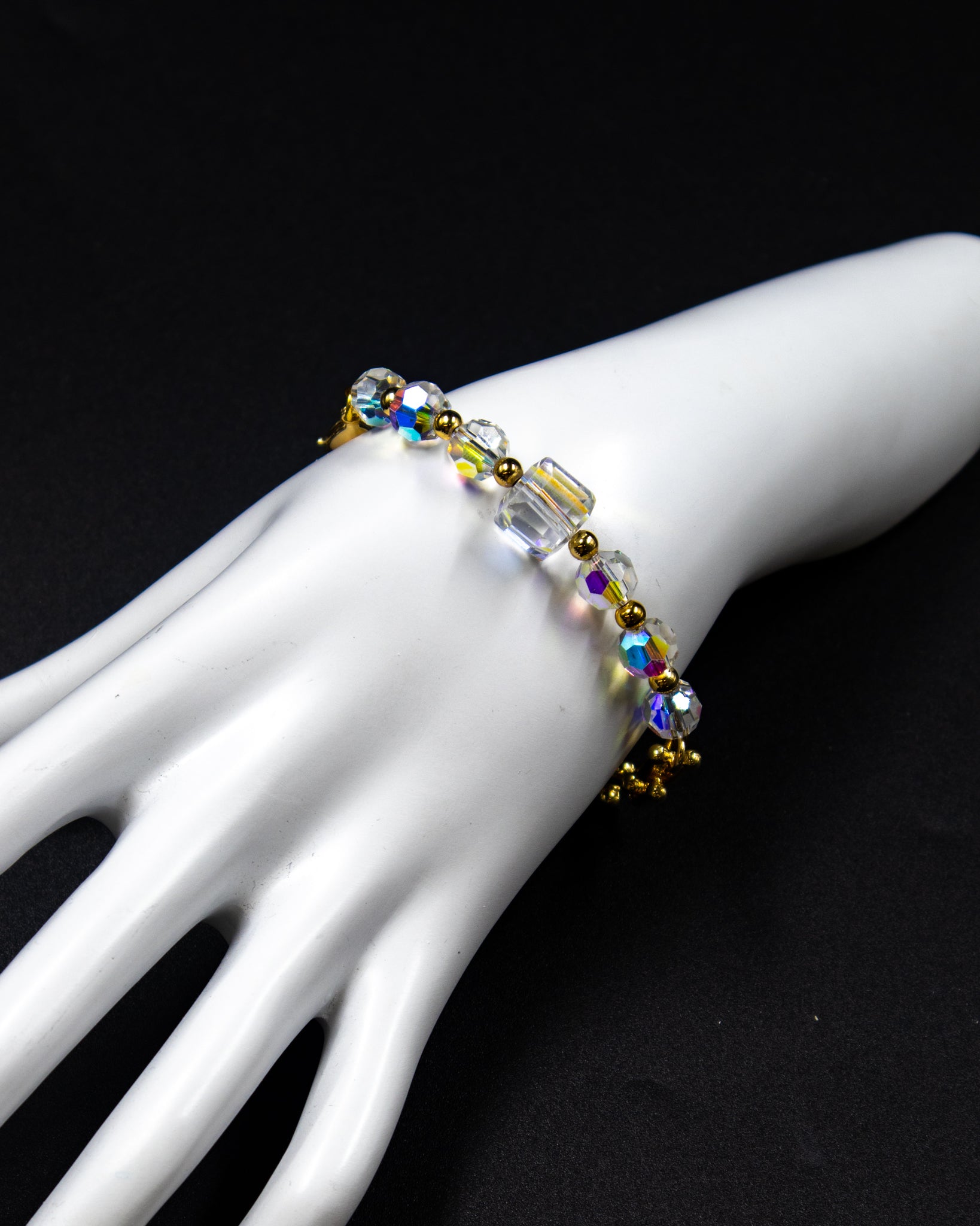 Pulsera con dijes tornasol - M2 Oro Laminado