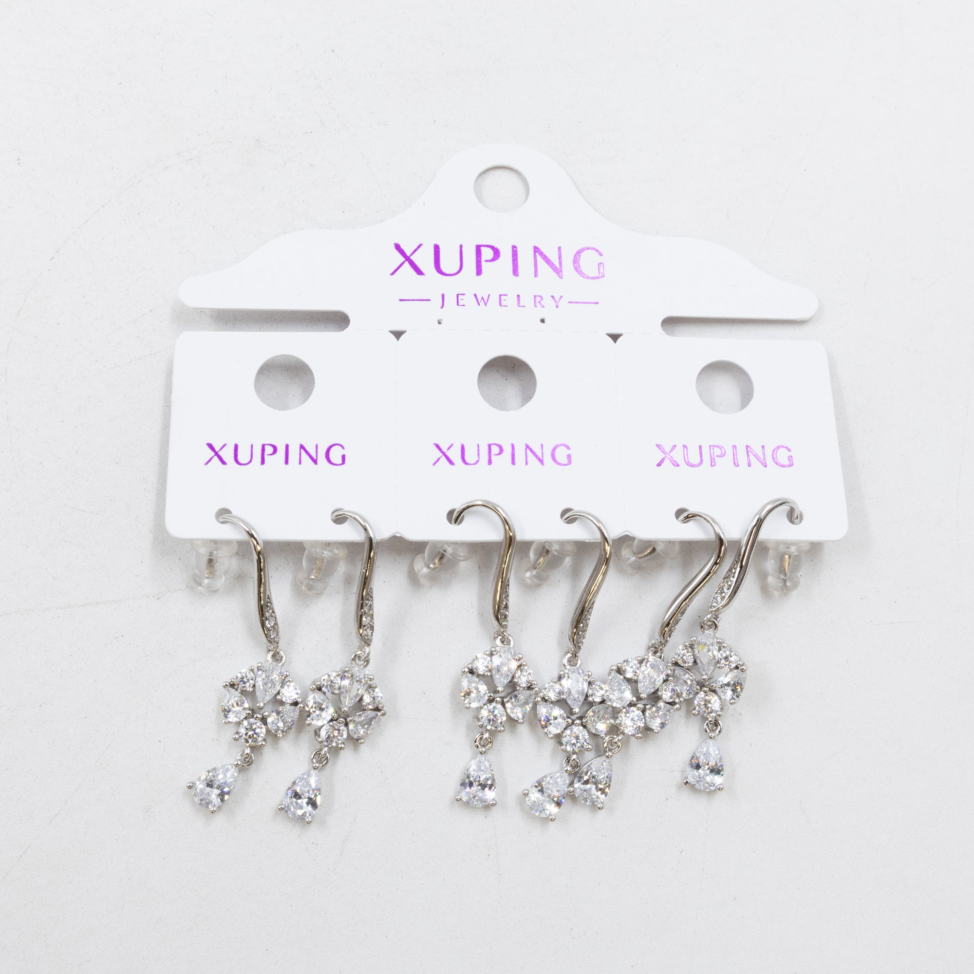 Paquete de tres pares de Aretes Plateados Xuping con piedras M3 Oro Laminado