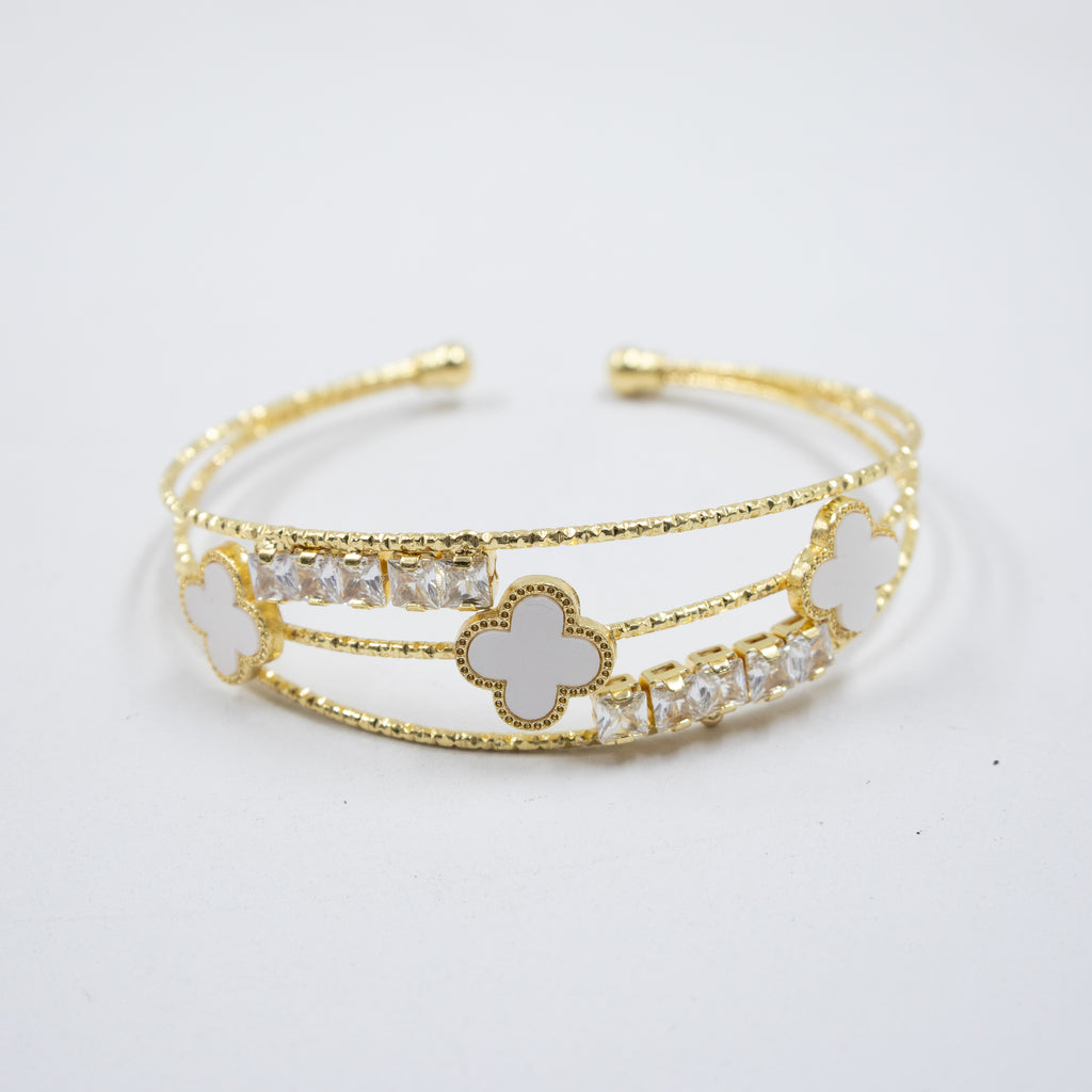 Pulsera dorada con flor y piedras blancas M1 Oro Laminado