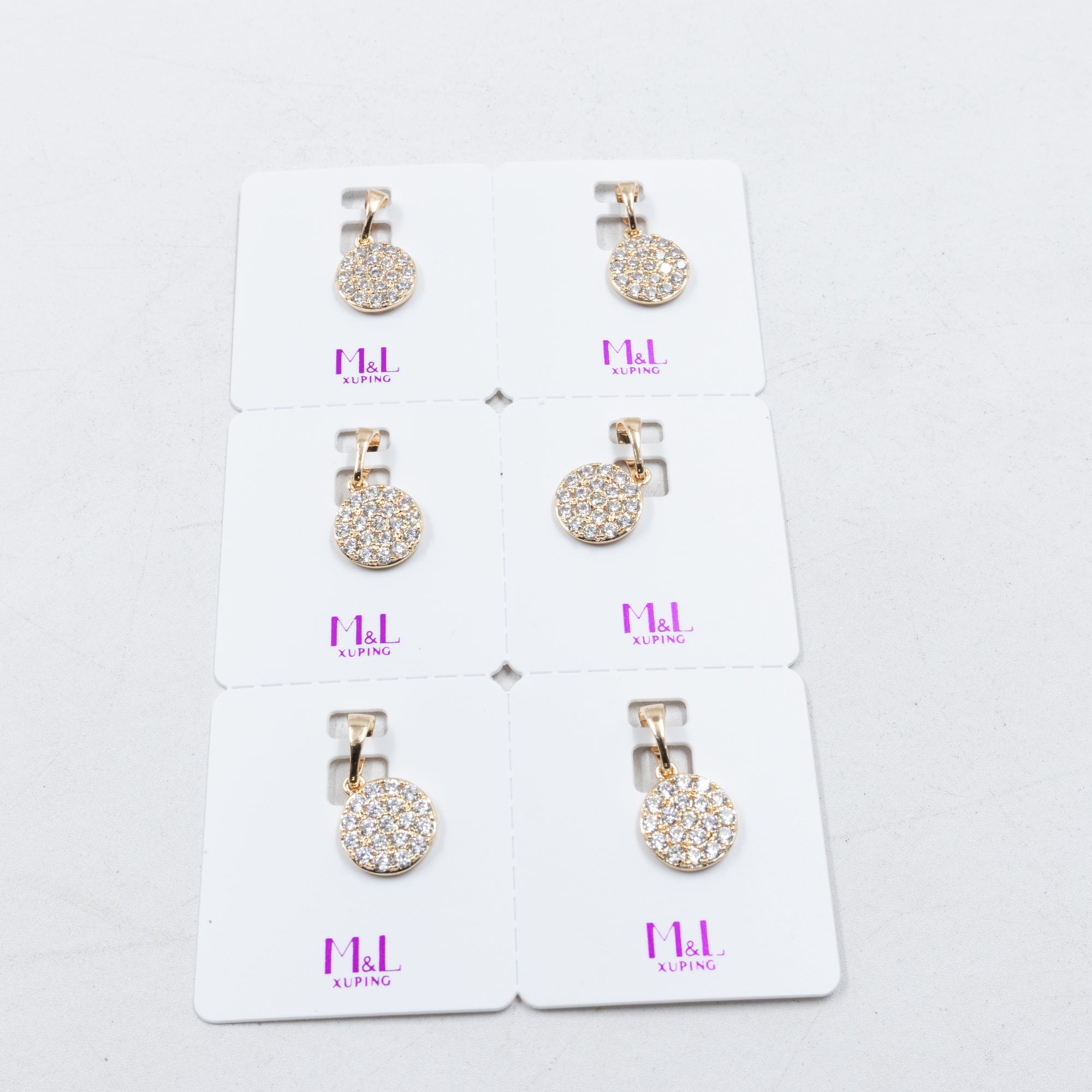 Paquete de 6 dijes con Piedras Oro Rosado  M4 Oro Laminado