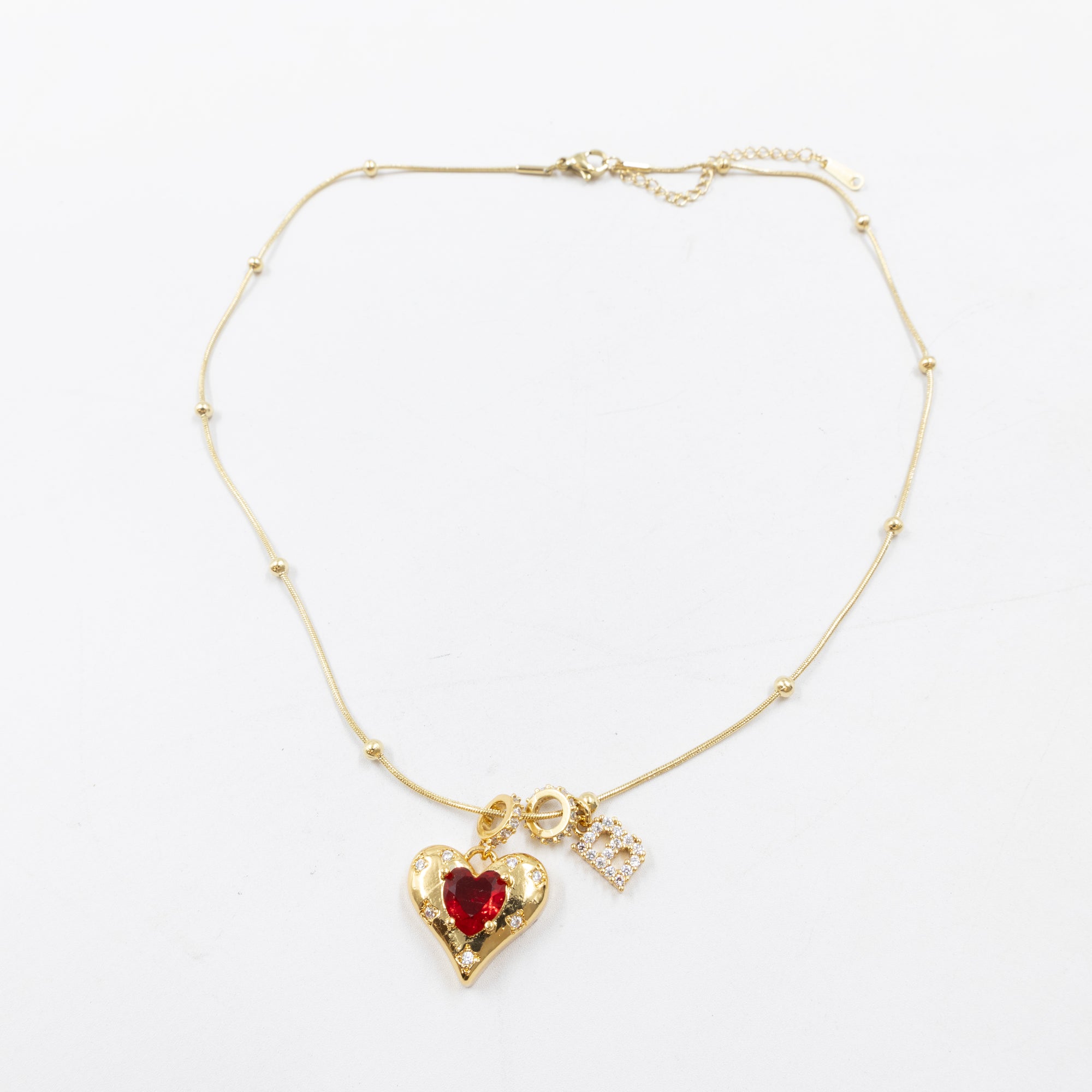 Collares Dorados con dije de Letra y corazon M1 Oro Laminado