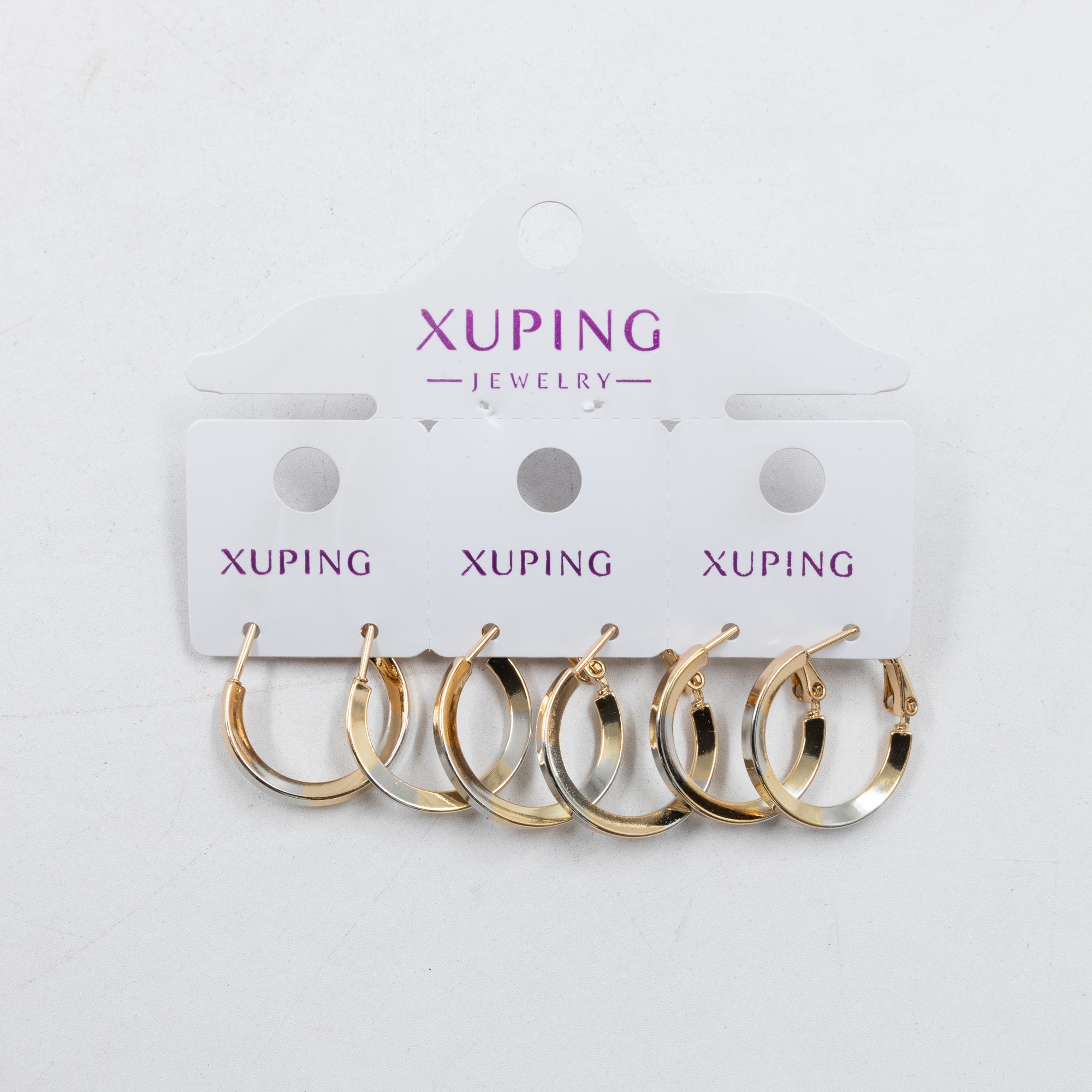 Paquete de tres pares de Aretes Dorados Xuping con piedras M7 Oro Laminado