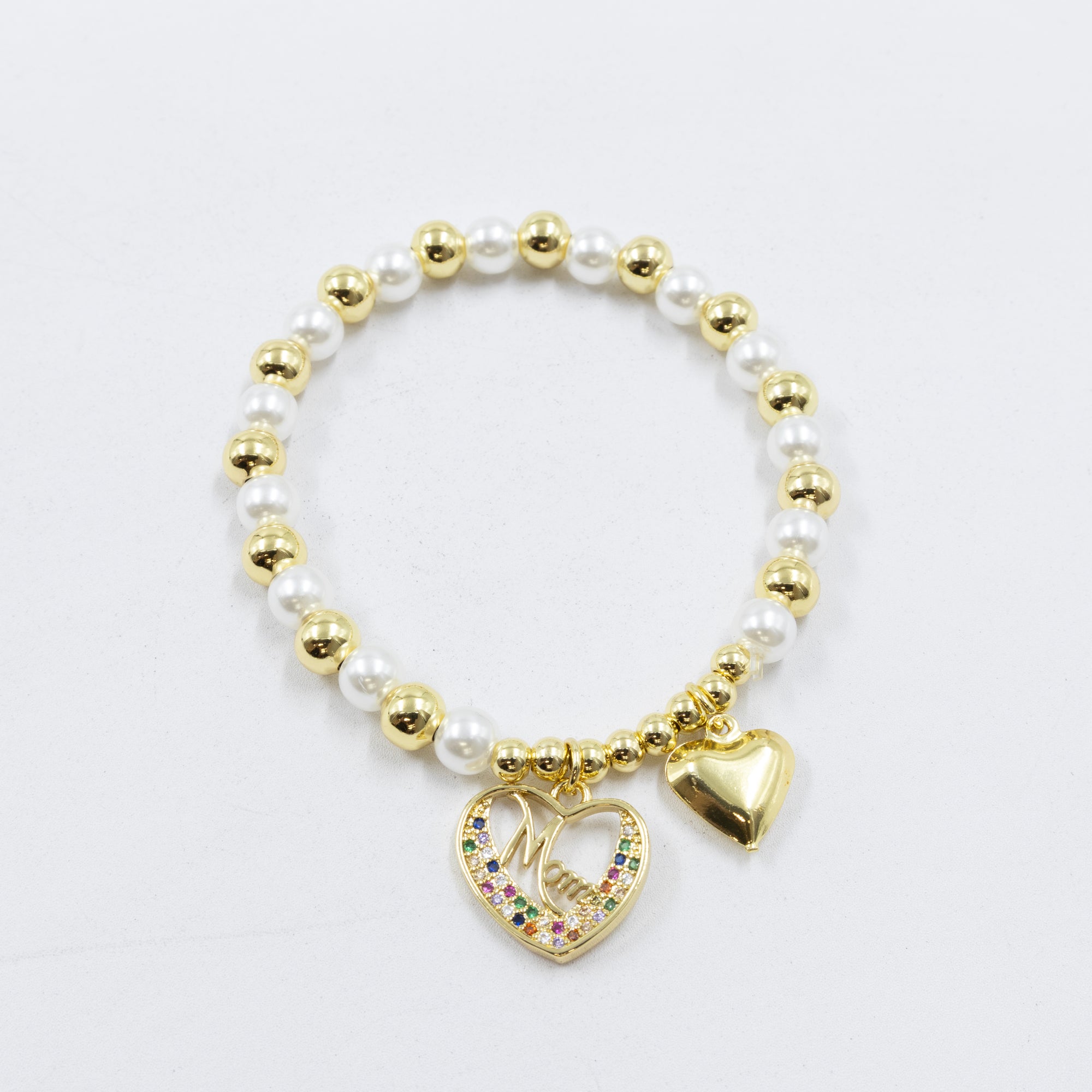 Pulsera con dije de Mamá M2 Oro Laminado 05/03/26