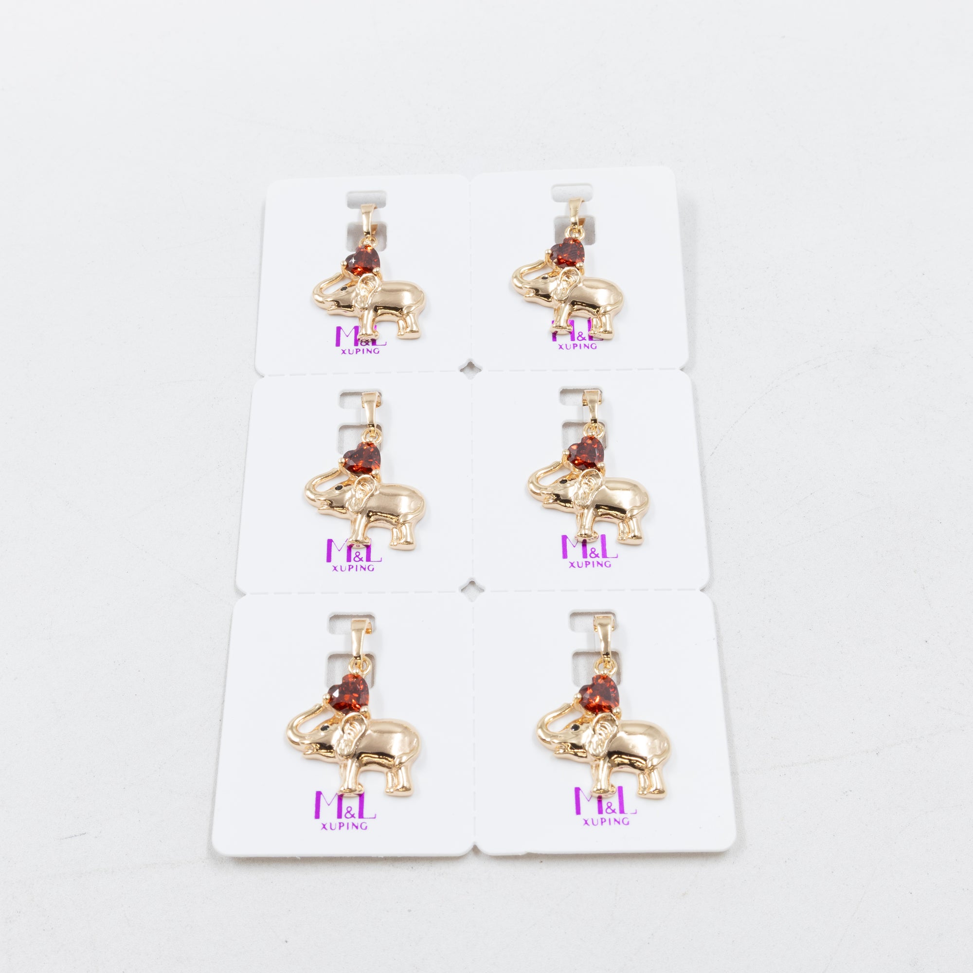 Paquete de 6 dijes con Piedras Oro Rosado  M5 Oro Laminado