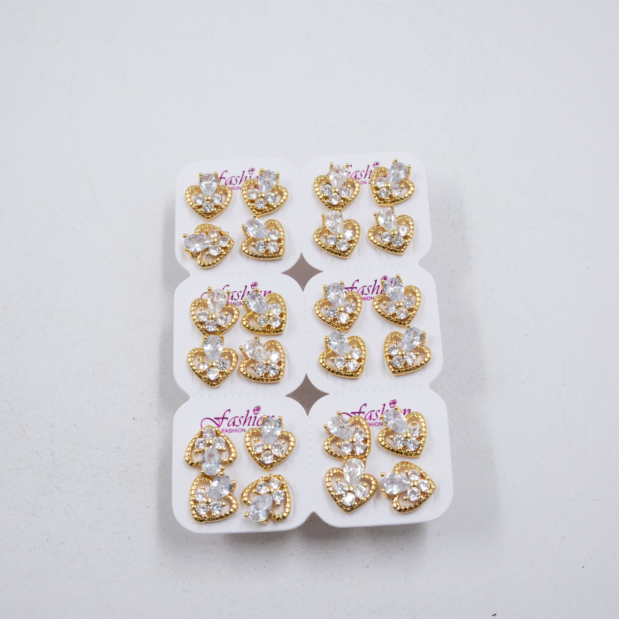Paquete de 12 pares de Aretes Dorados M1 Oro Laminado