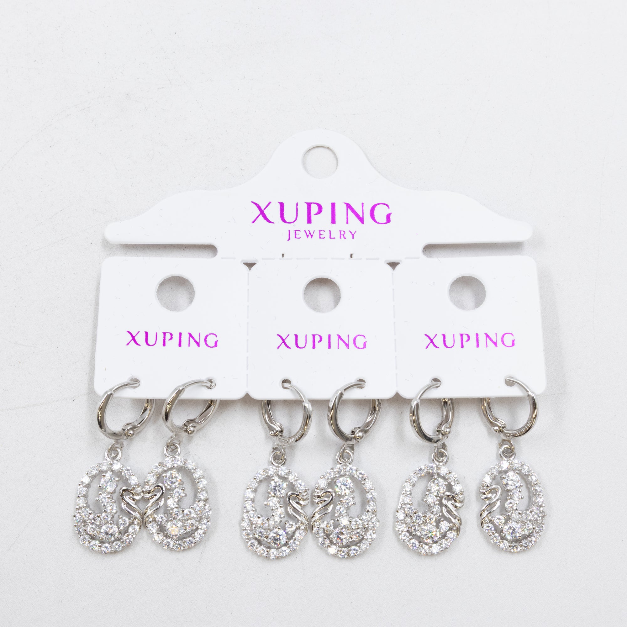 Paquete de tres pares de Aretes Plateados Xuping con piedras M1 Oro Laminado