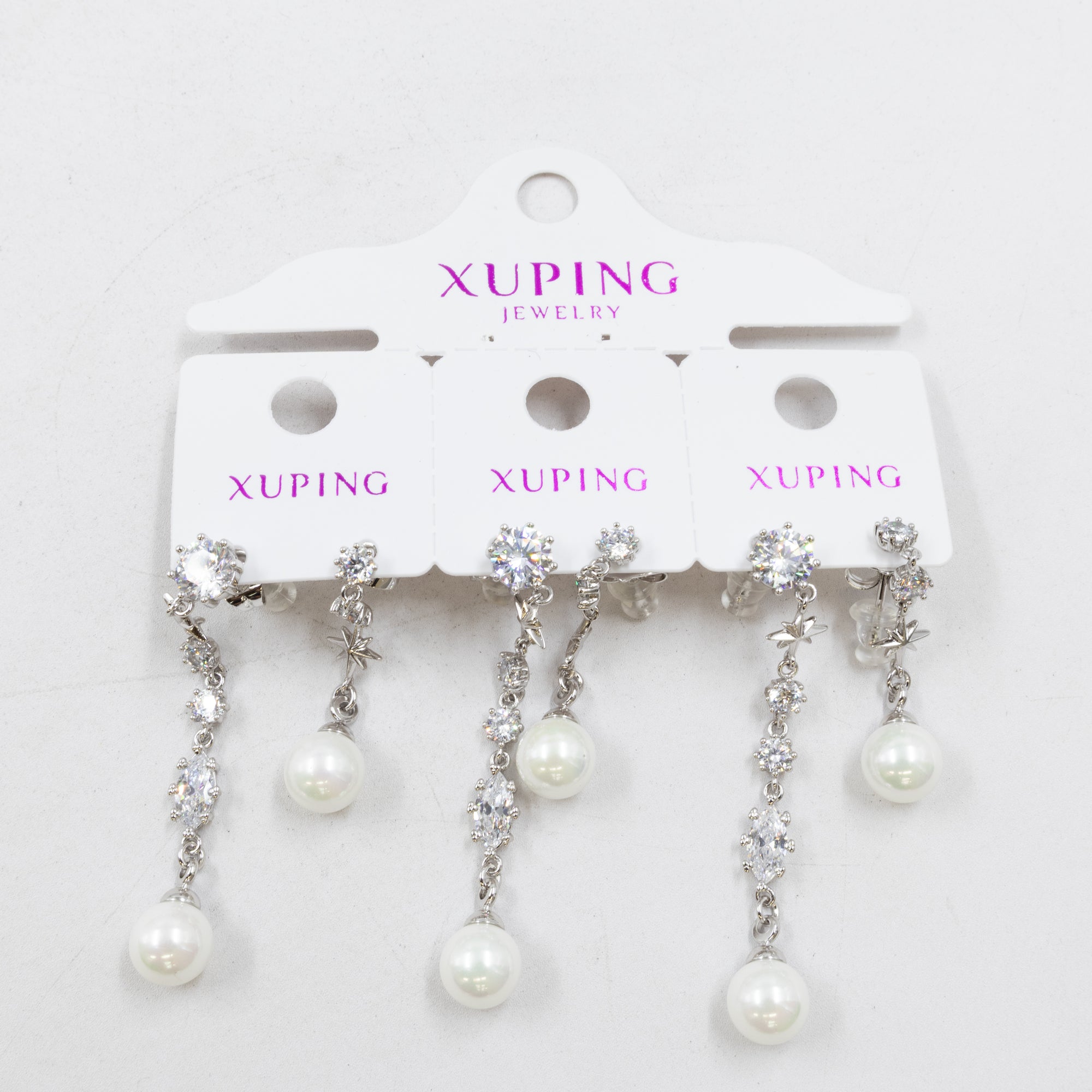 Paquete de tres pares de Aretes Plateados Xuping con piedras M3 Oro Laminado