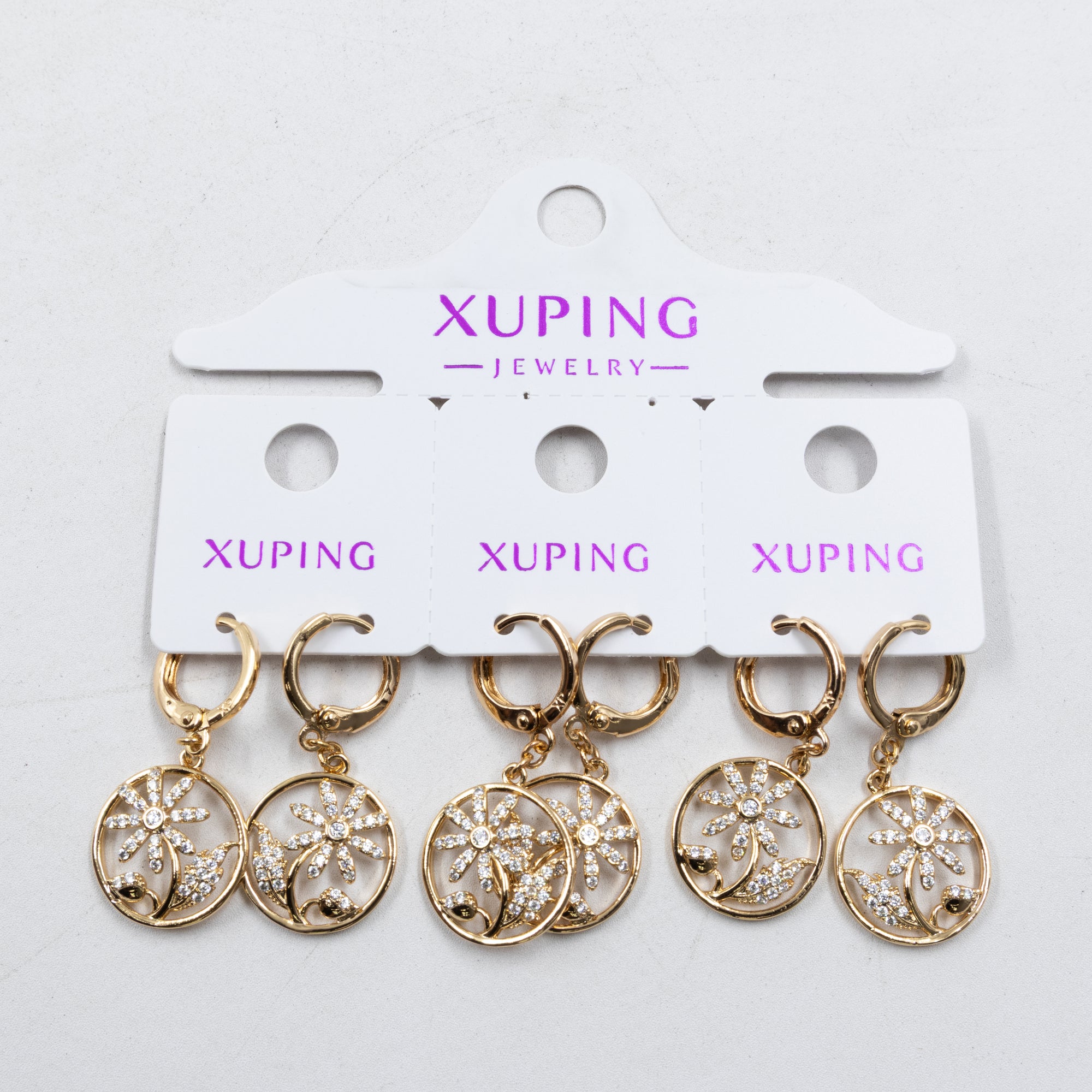 Paquete de tres pares de Aretes Dorados Xuping con piedras M6 Oro Laminado