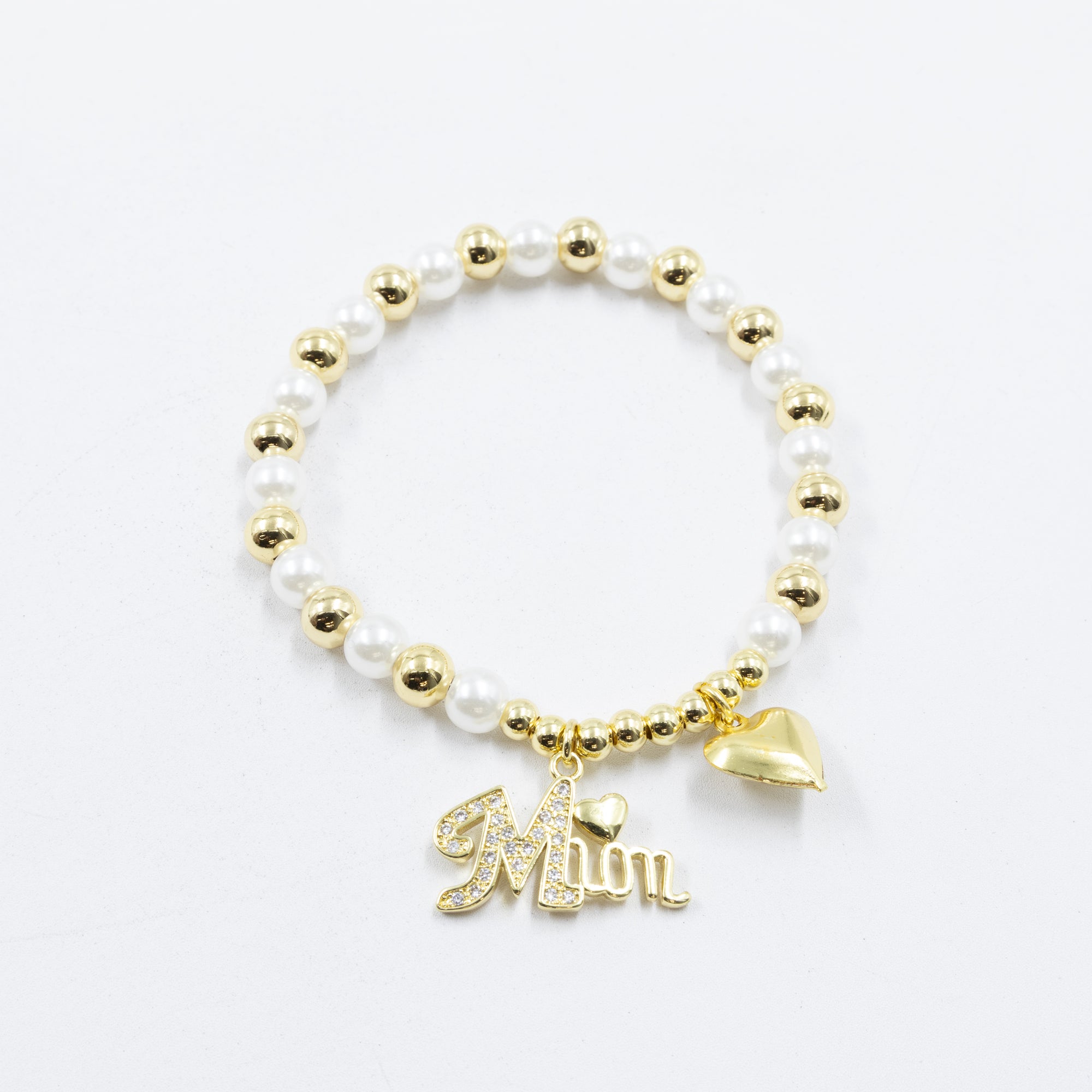 Pulsera con dije de Mamá M4 Oro Laminado 05/03/26