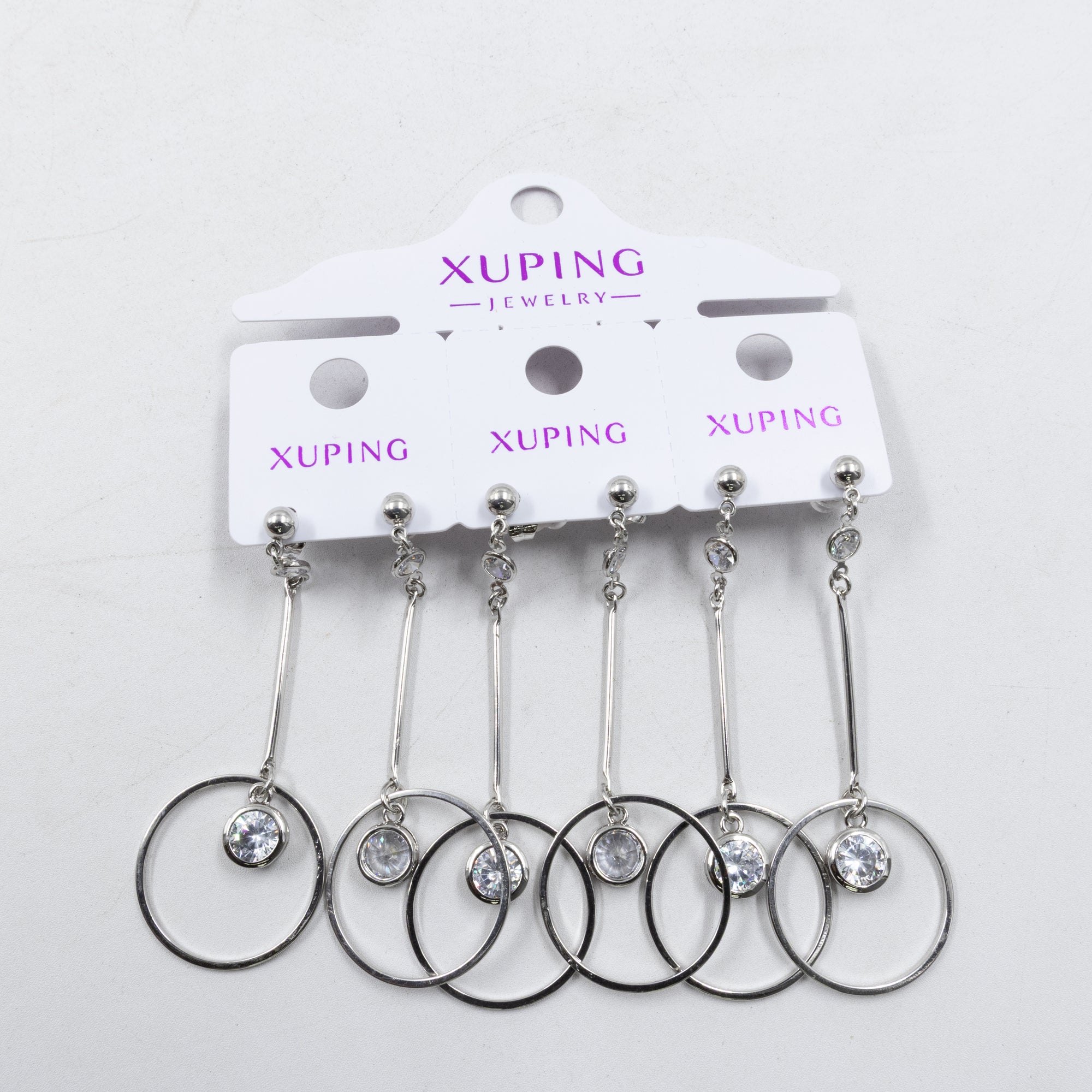 Paquete de tres pares de Aretes Plateados Xuping con piedras M4 Oro Laminado