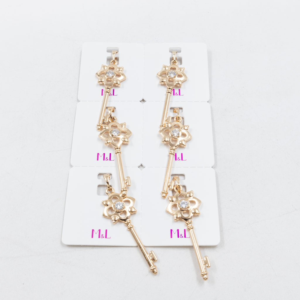 Paquete de 6 dijes con Piedras Oro Rosado  M7 Oro Laminado