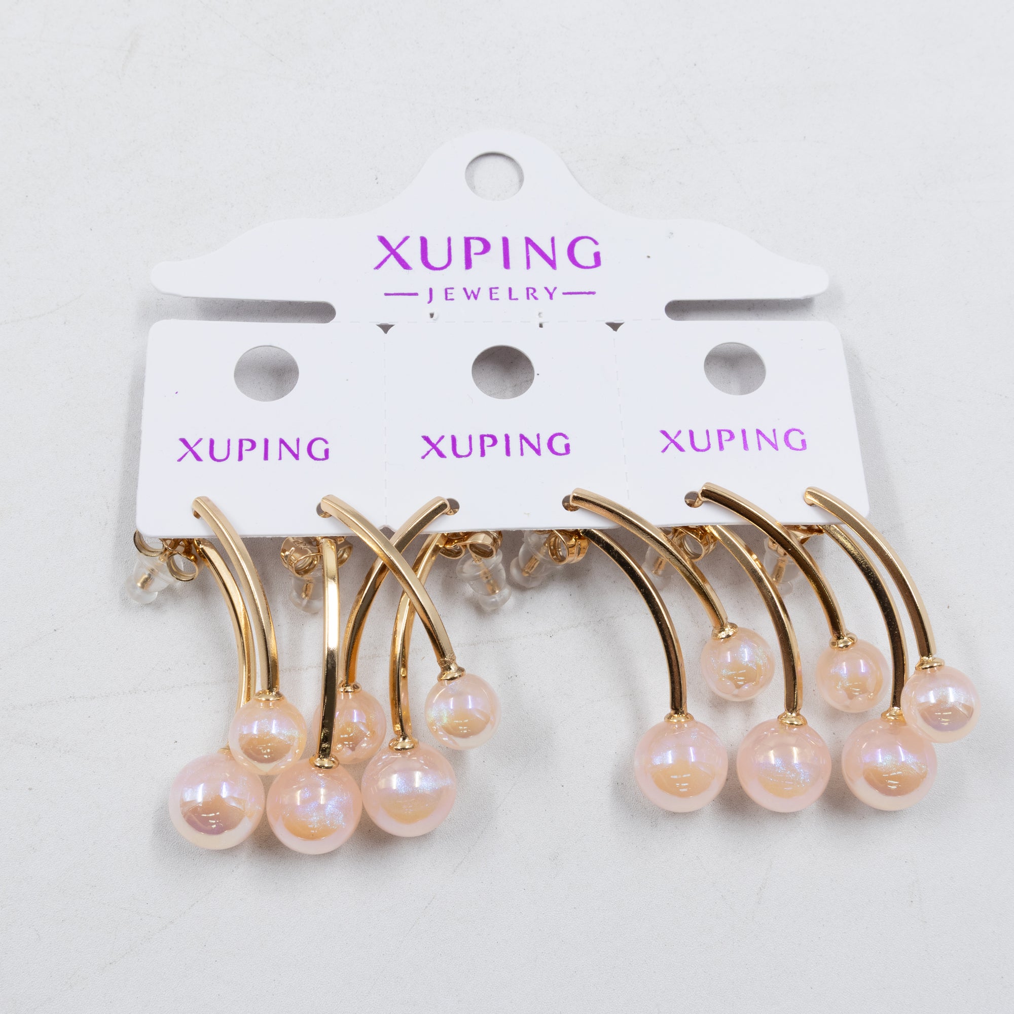 Paquete de tres pares de Aretes Dorados Xuping con piedras M5 Oro Laminado