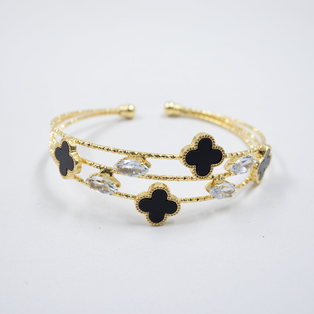 Pulsera dorada con flor y piedras blancas M1 Oro Laminado