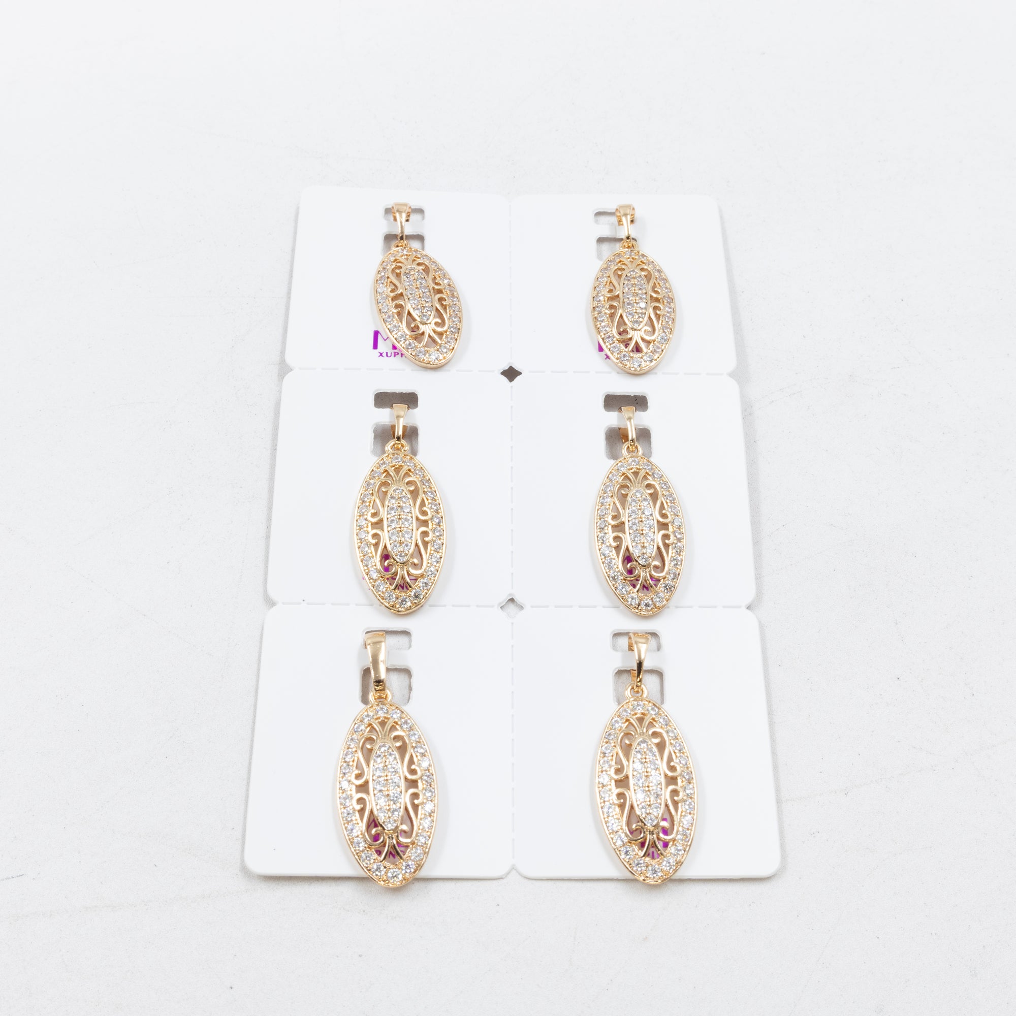 Paquete de 6 dijes con Piedras Oro Rosado  M6 Oro Laminado