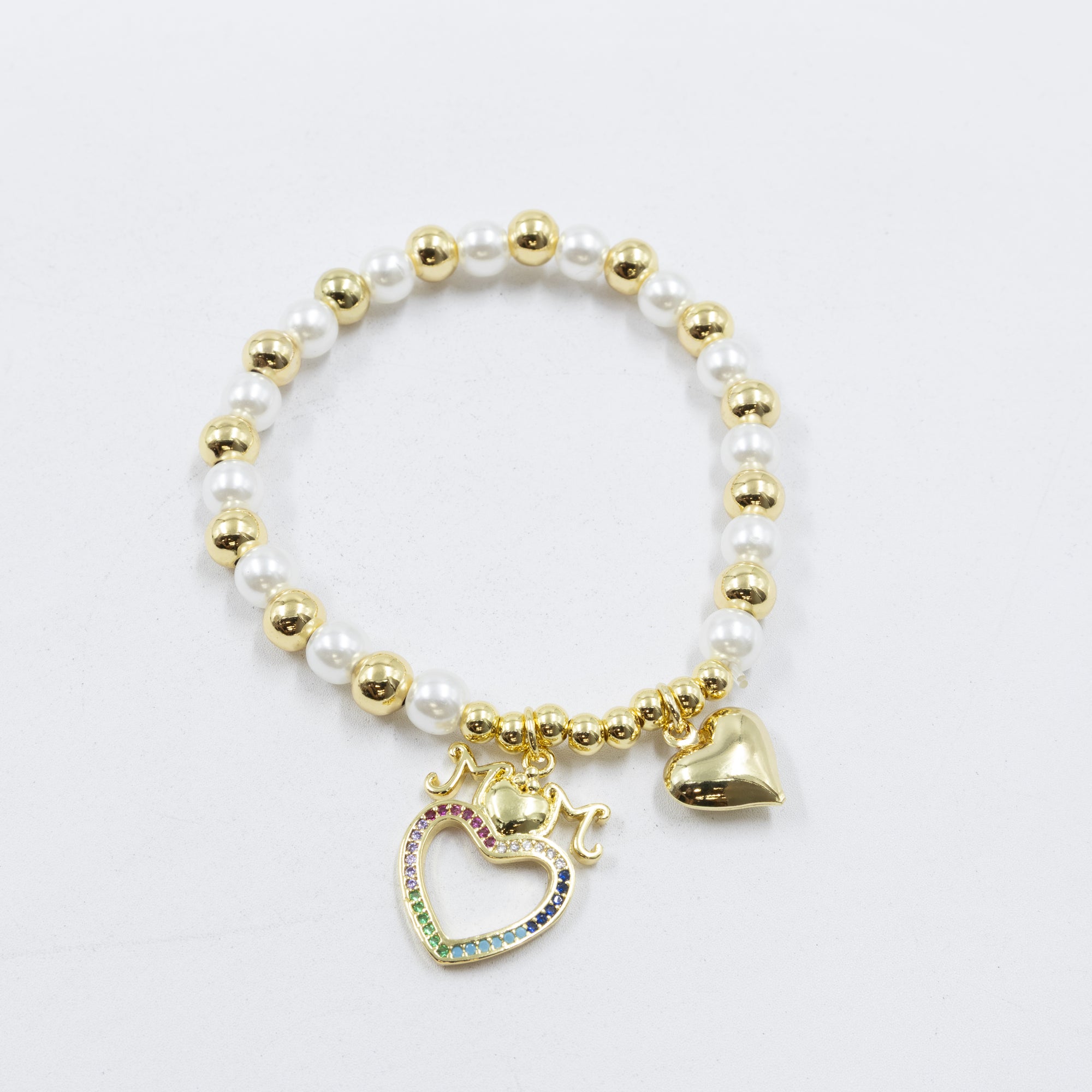 Pulsera con dije de Mamá M3 Oro Laminado 05/03/26