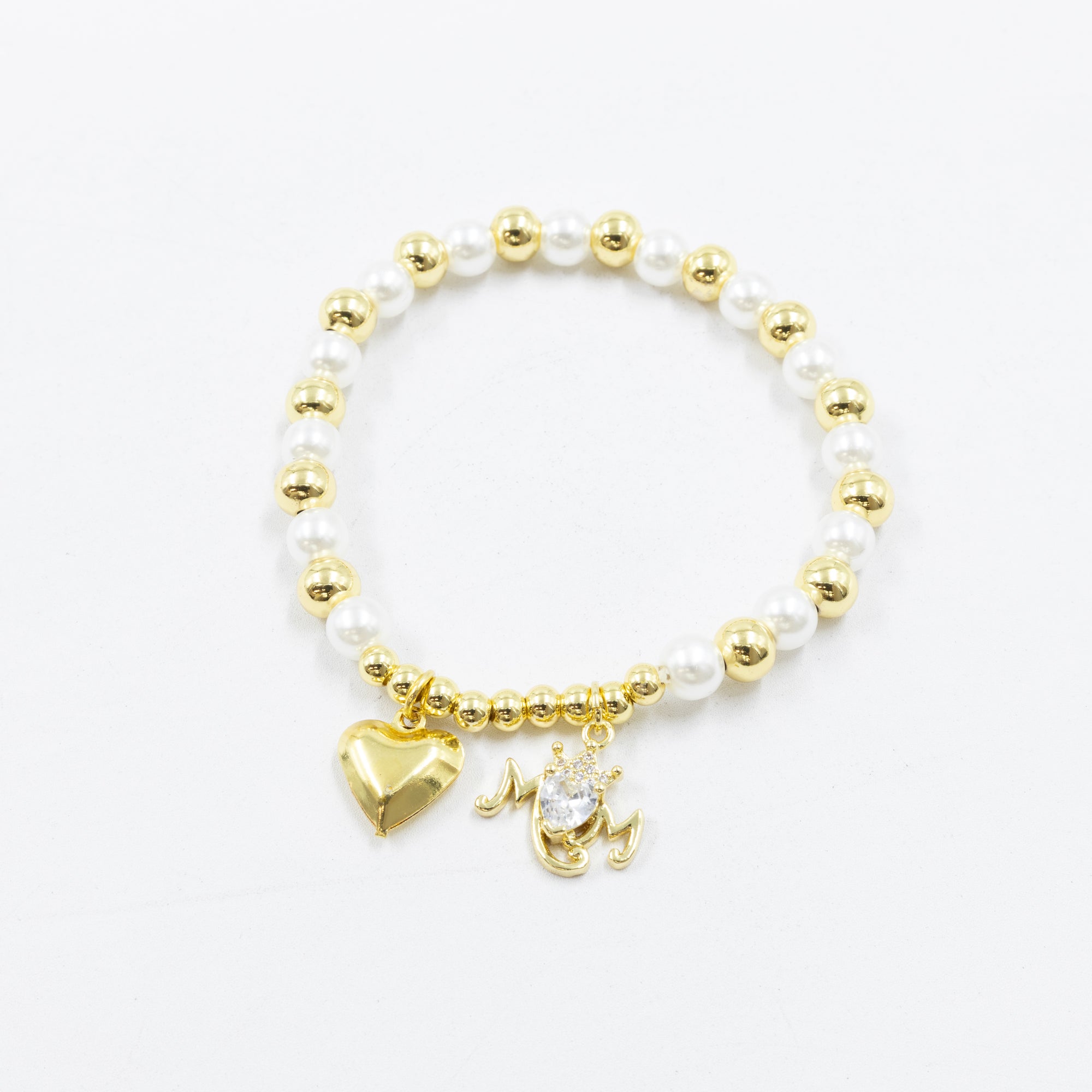 Pulsera con dije de Mamá M6 Oro Laminado 05/03/26