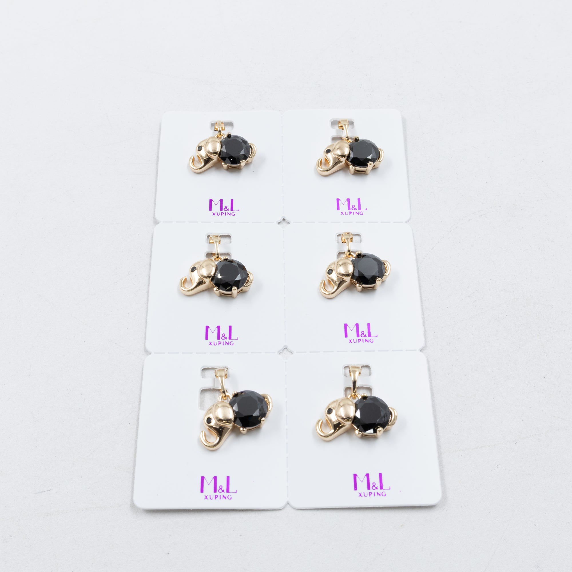 Paquete de 6 dijes con Piedras Oro Rosado  M5 Oro Laminado