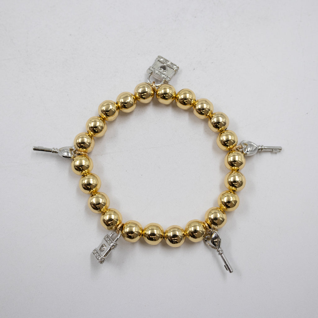 Pulseras Doradas y Plateadas con dije M1 Oro Laminado