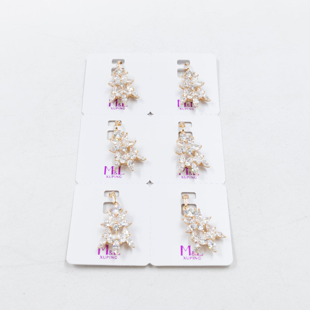 Paquete de 6 dijes con Piedras Oro Rosado  M7 Oro Laminado