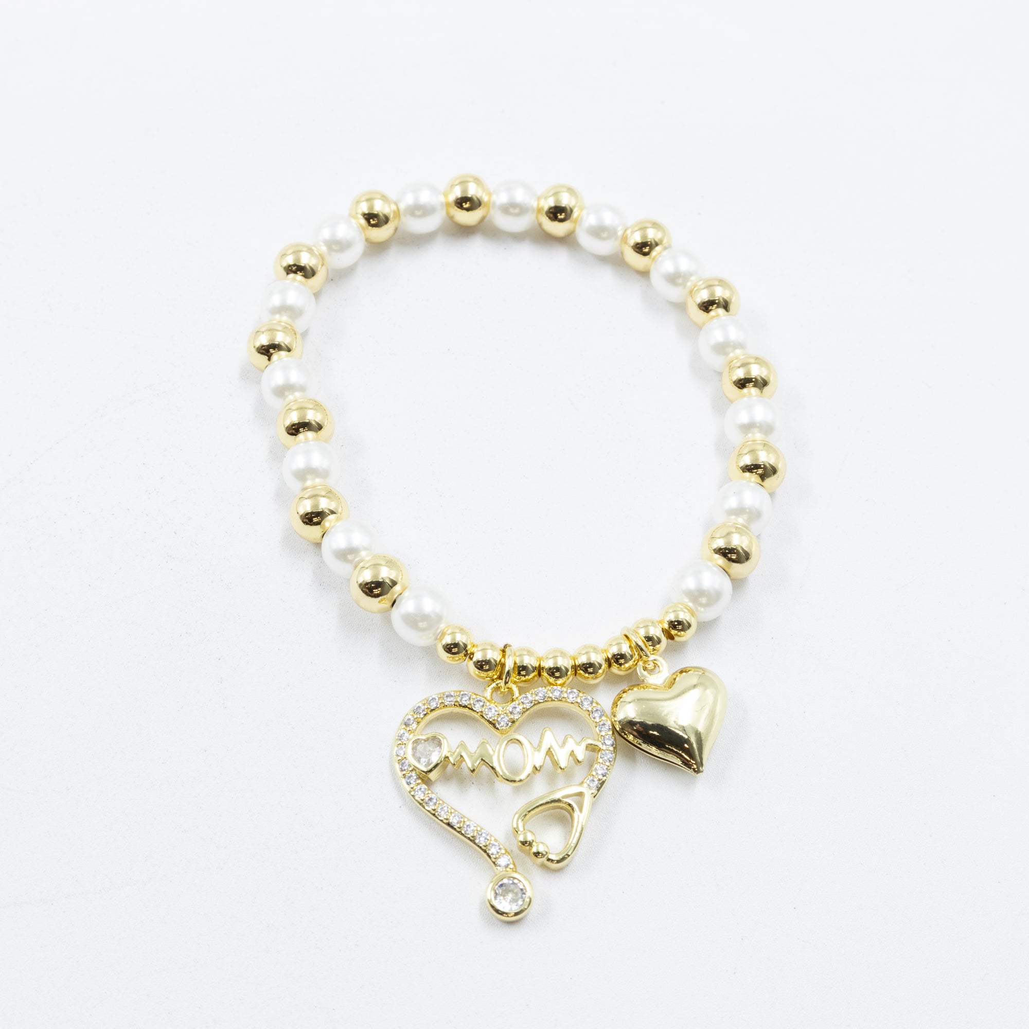 Pulsera con dije de Mamá M3 Oro Laminado 05/03/26