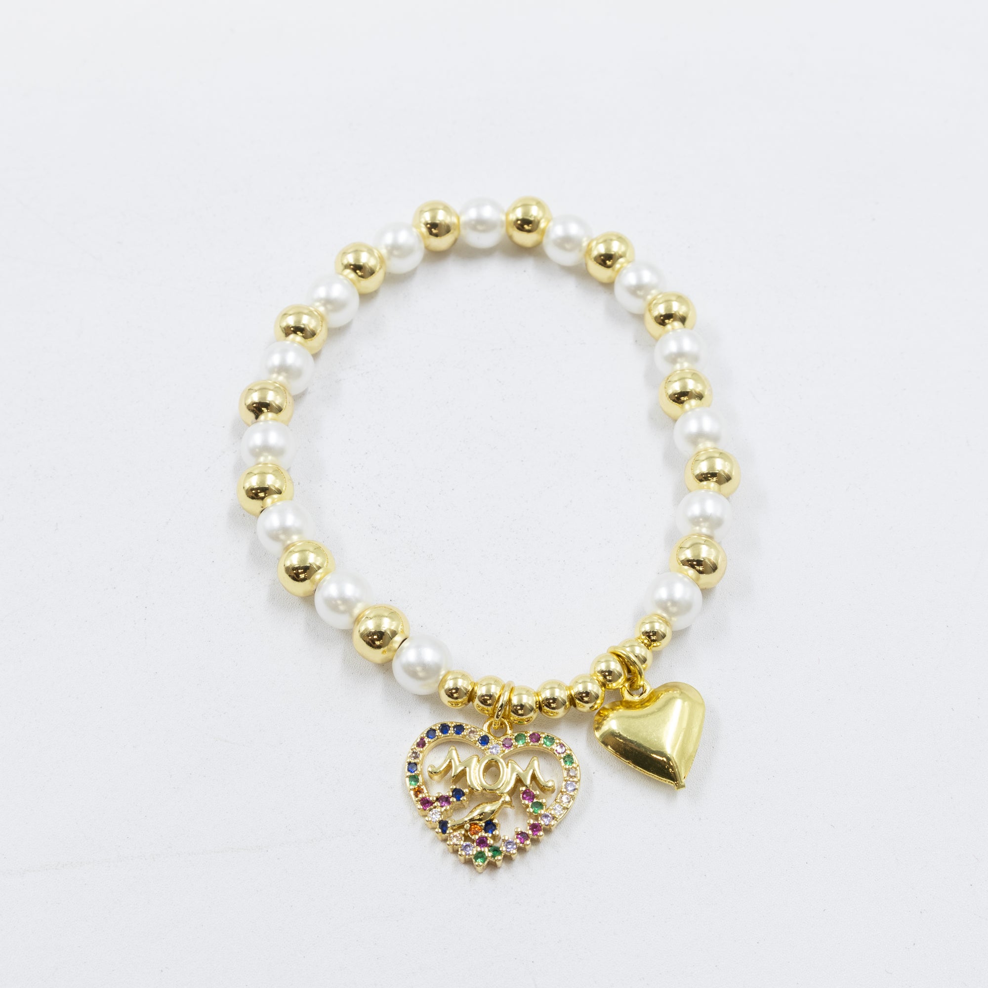 Pulsera con dije de Mamá M1 Oro Laminado 05/03/26