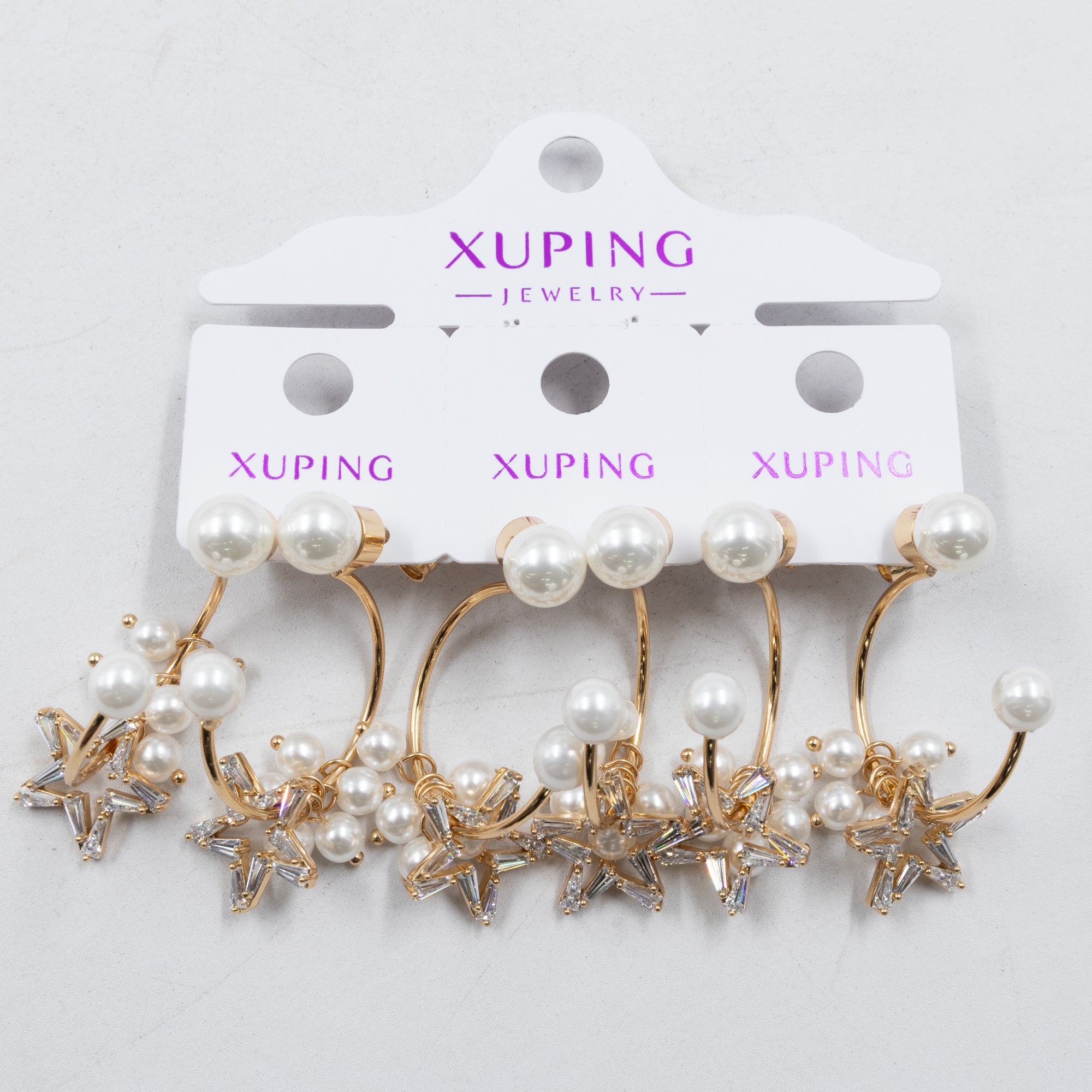 Paquete de tres pares de Aretes Dorados Xuping con piedras M5 Oro Laminado