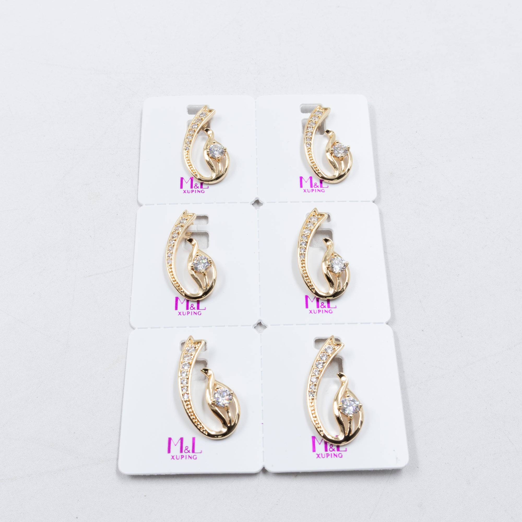 Paquete de 6 dijes con Piedras Oro Rosado  M2 Oro Laminado