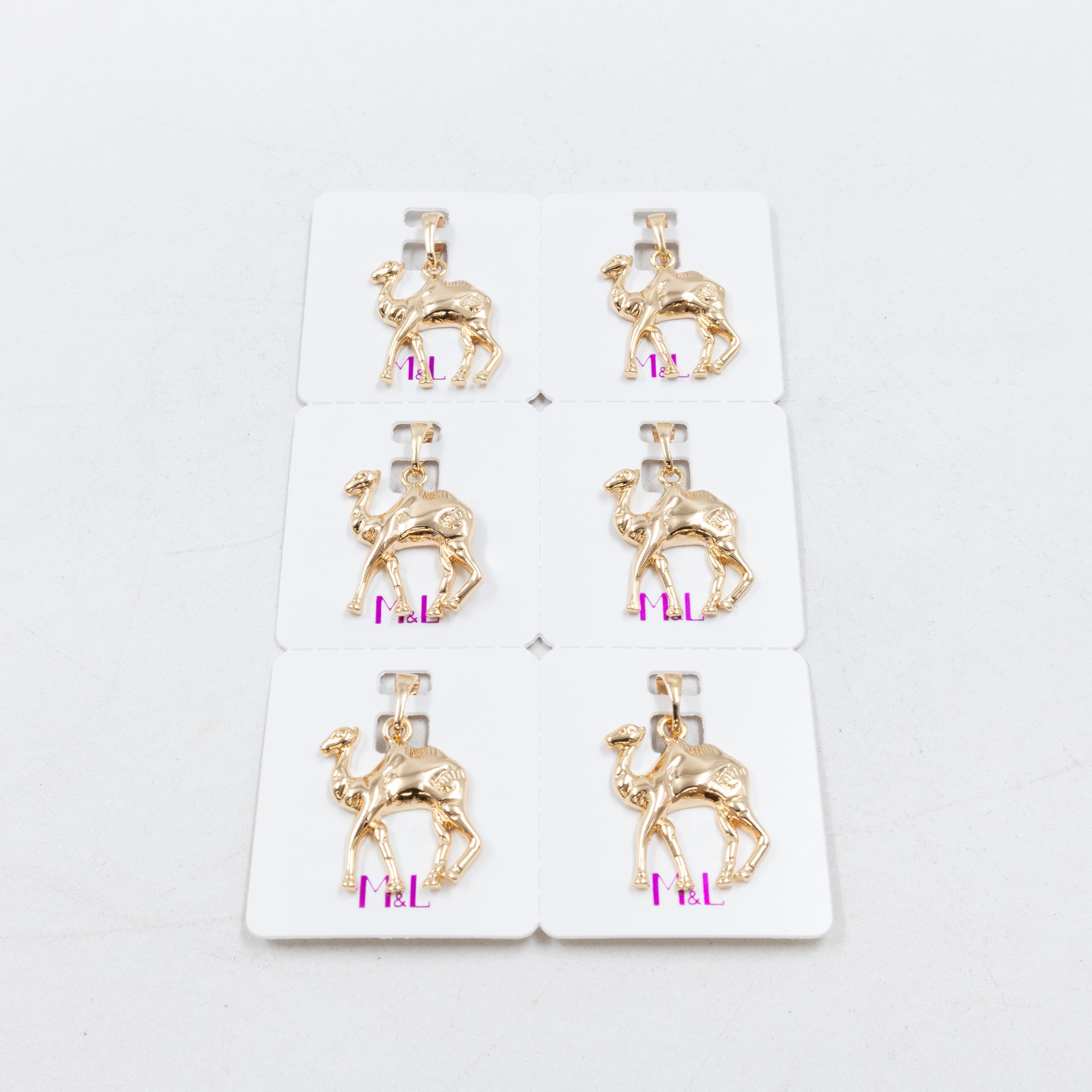 Paquete de 6 dijes con Piedras Oro Rosado  M7 Oro Laminado