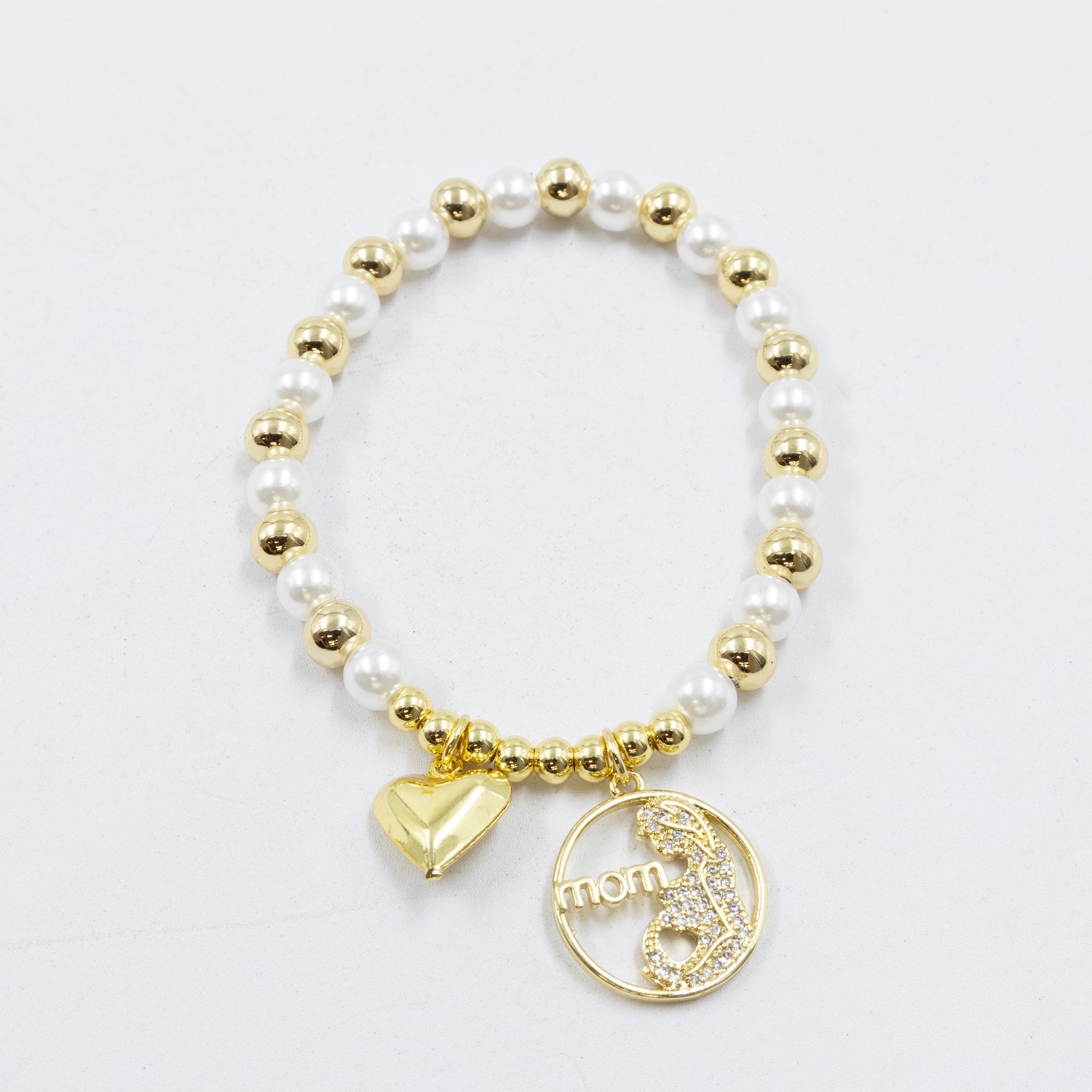 Pulsera con dije de Mamá M2 Oro Laminado 05/03/26