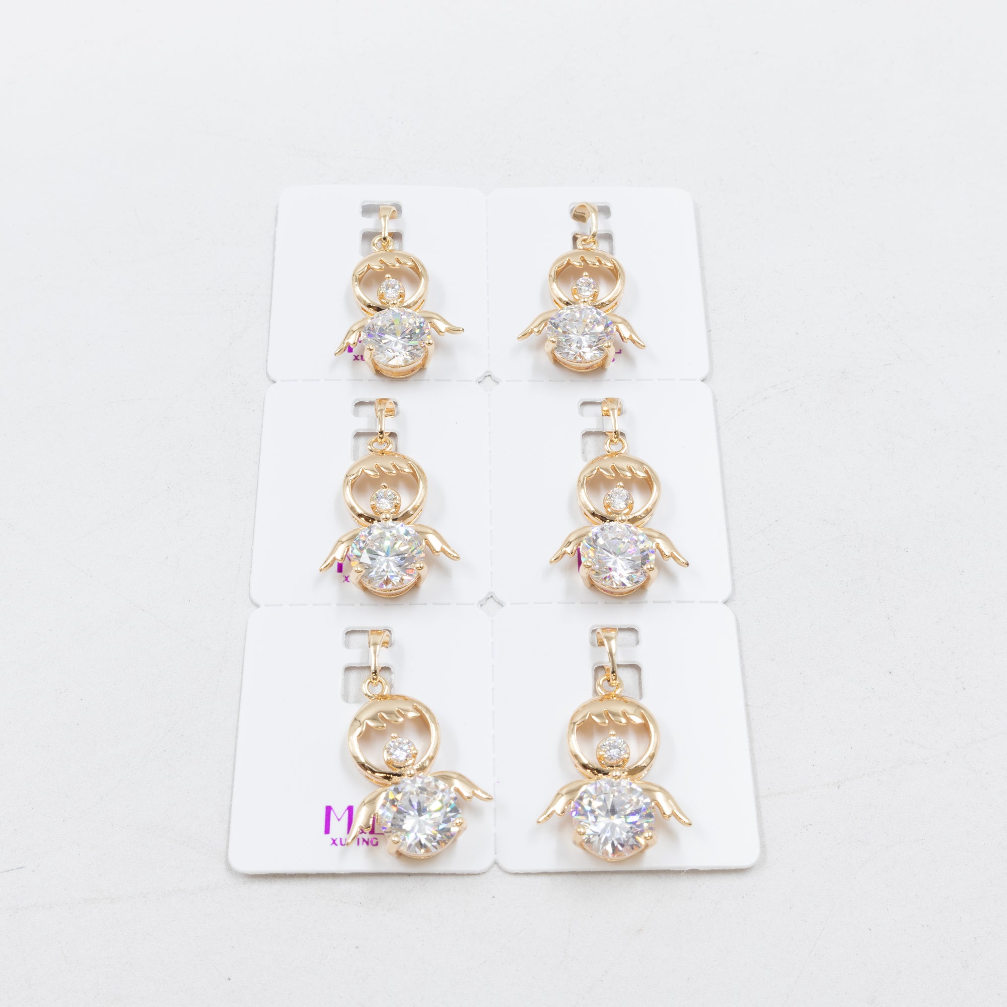Paquete de 6 dijes con Piedras Oro Rosado  M6 Oro Laminado