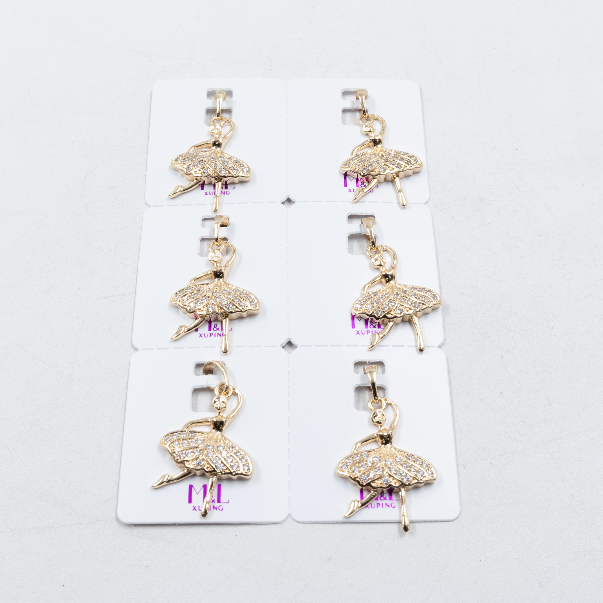 Paquete de 6 dijes con Piedras Oro Rosado  M4 Oro Laminado