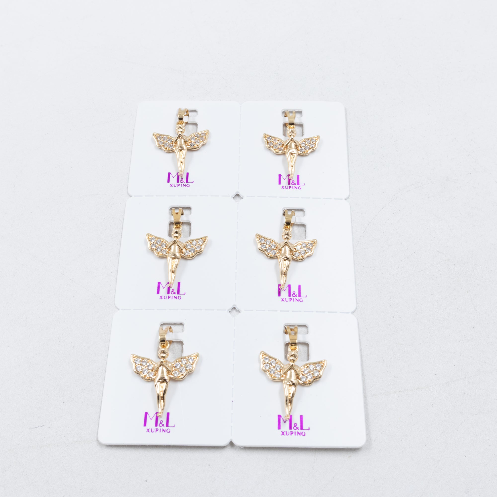 Paquete de 6 dijes con Piedras Oro Rosado  M5 Oro Laminado