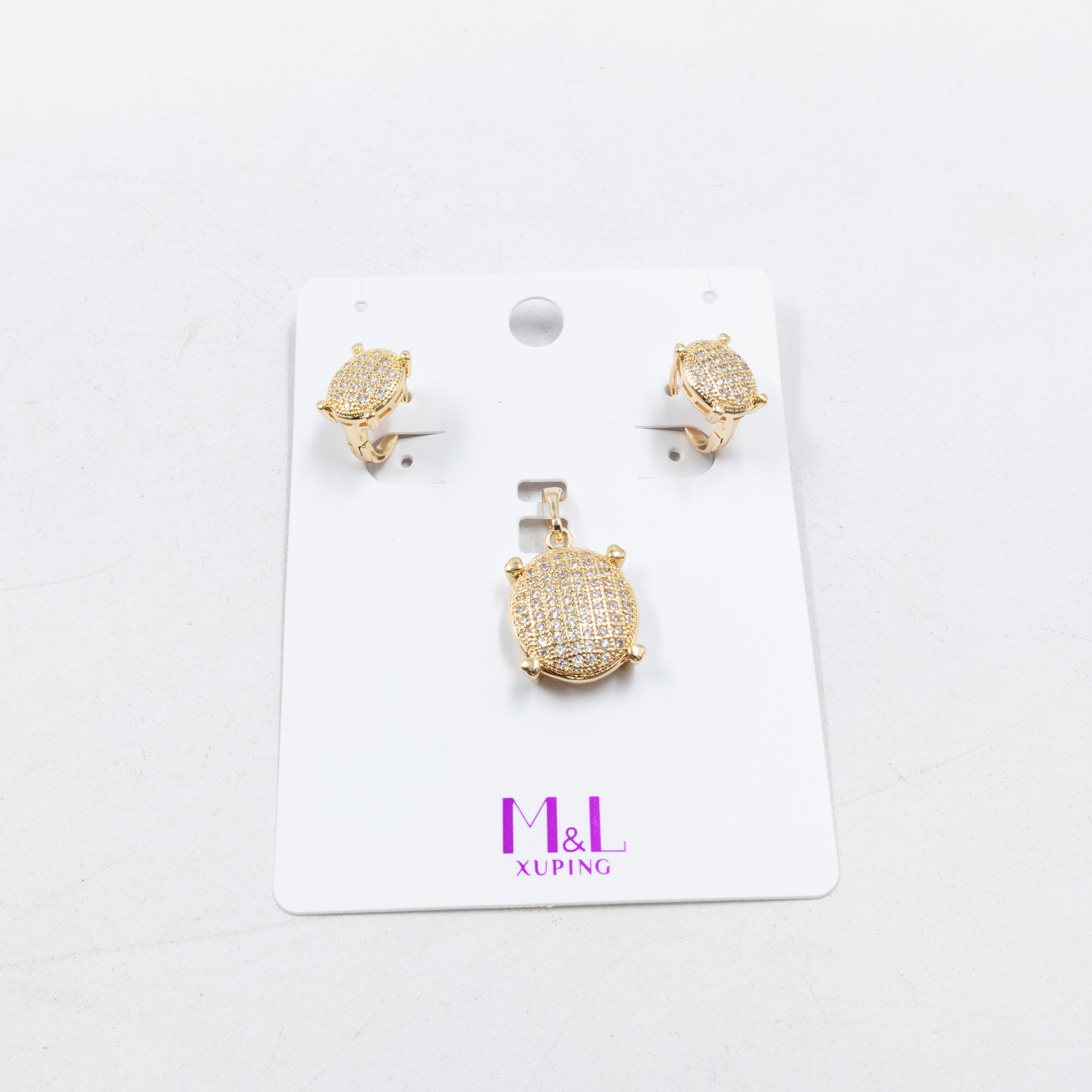 Conjunto de de Aretes y Dije M7 Oro Laminado