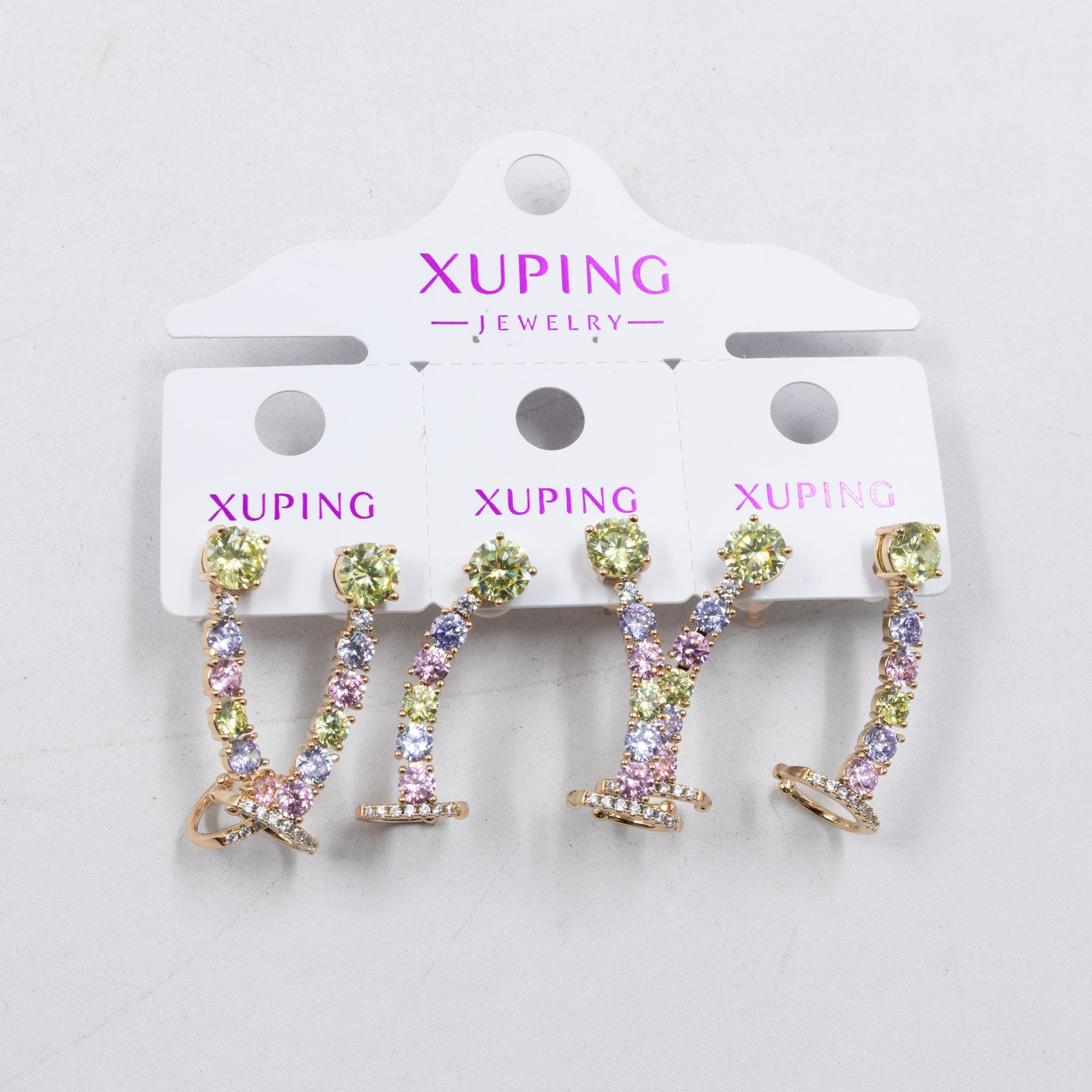 Paquete de tres pares de Aretes Dorados Xuping con piedras M5 Oro Laminado
