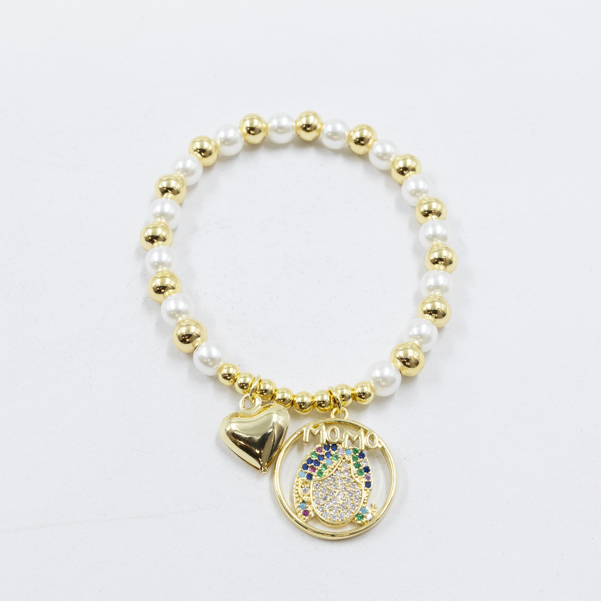 Pulsera con dije de Mamá M1 Oro Laminado 05/03/26