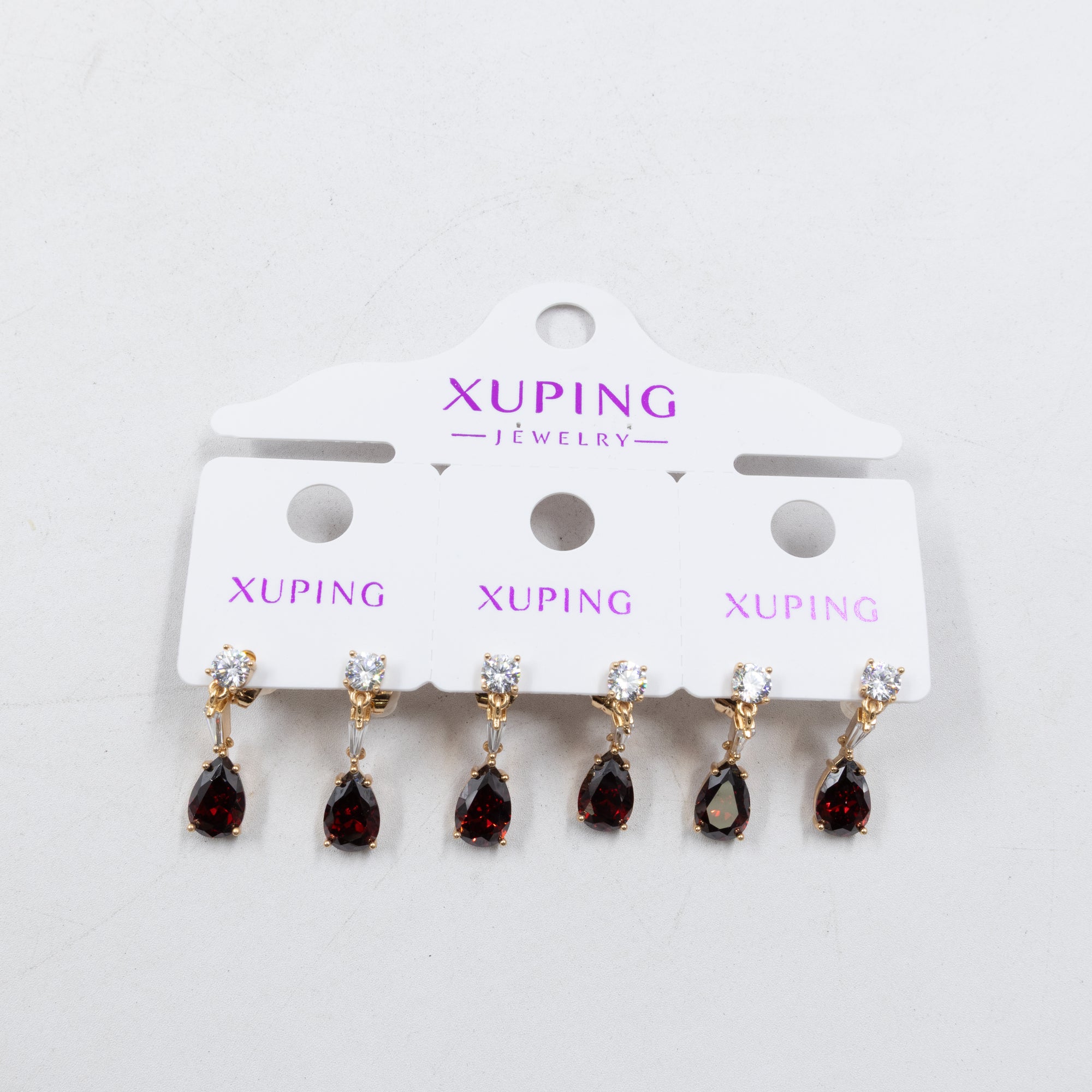 Paquete de tres pares de Aretes Dorados Xuping con piedras M7 Oro Laminado