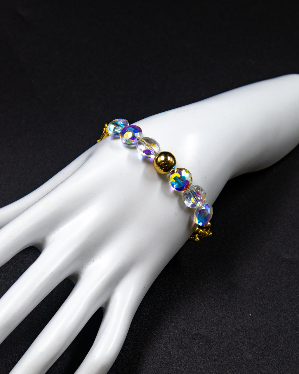 Pulsera con dijes tornasol - M2 Oro Laminado